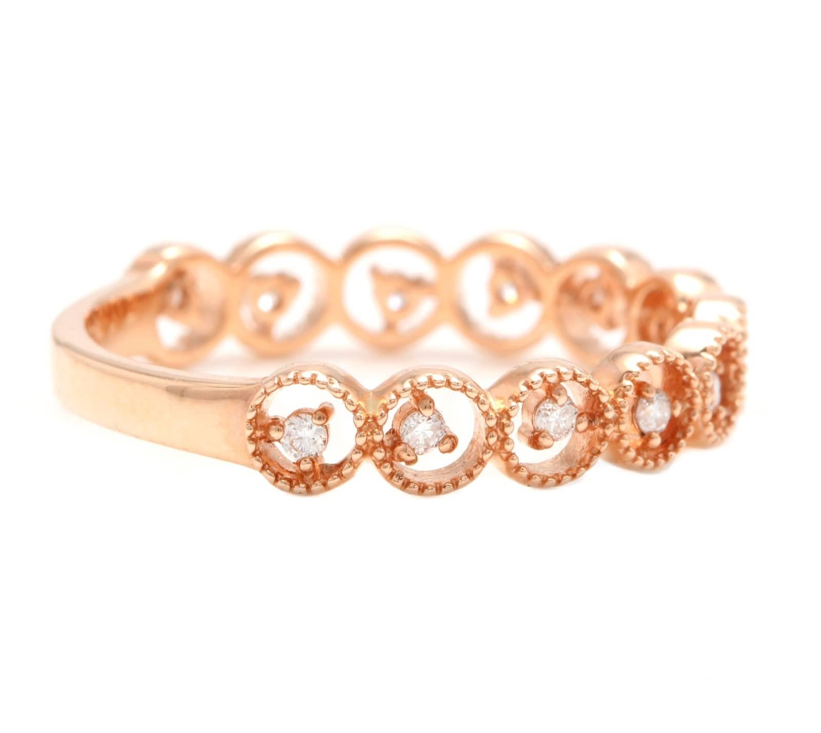Splendid 0.15 Carats Natural Diamond 14K Solid Rose Gold Ring

Suggested Replacement Value: Approx. $1,300.00

Stamped: 14K

Total Natural Round Cut Diamonds Weight: Approx. 0.15 Carats (color G-H / Clarity SI1-SI2)

The width of the ring is: 3.70mm