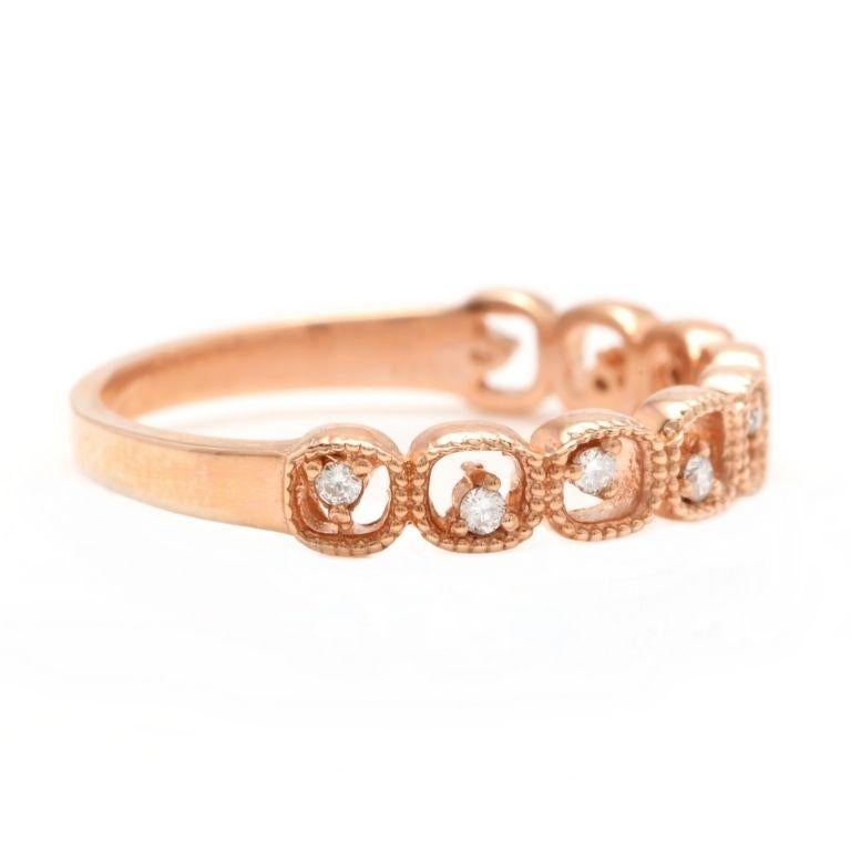 Splendid 0.10 Carats Natural Diamond 14K Solid Rose Gold Ring

Stamped: 14K

Total Natural Round Cut Diamonds Weight: Approx. 0.10 Carats (color G-H / Clarity SI1-SI2)

The width of the ring is: 3.70mm 

Item total weight: 2.1 grams

Ring size: 7