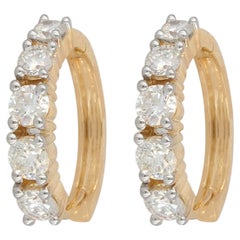 Pendientes de aro tipo «huggie» de oro amarillo de 14 quilates con diamantes naturales. Joyería fina unisex