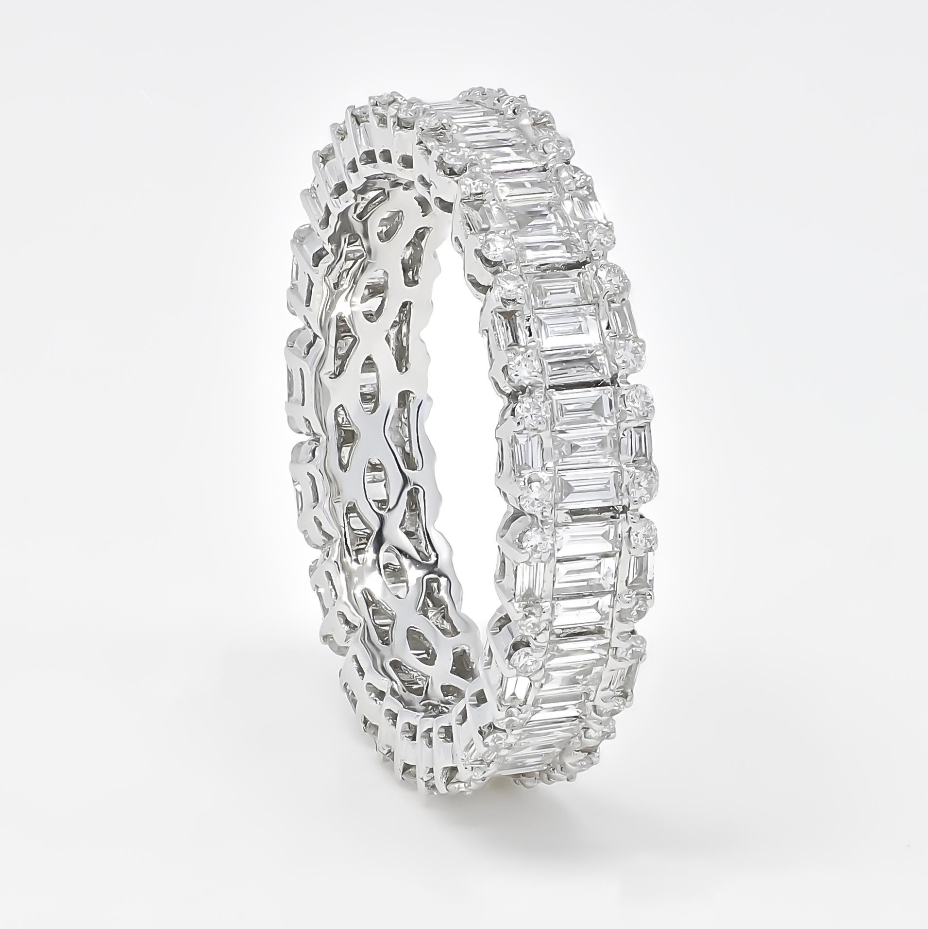 It is the 18KT White Gold Baguette Round Diamond Full Eternity Band with Gold Inlay, an exquisite diamond ring that embodies elegance, eternal love, and intricate craftsmanship.

Crafted in 18KT white gold, this full eternity band features a