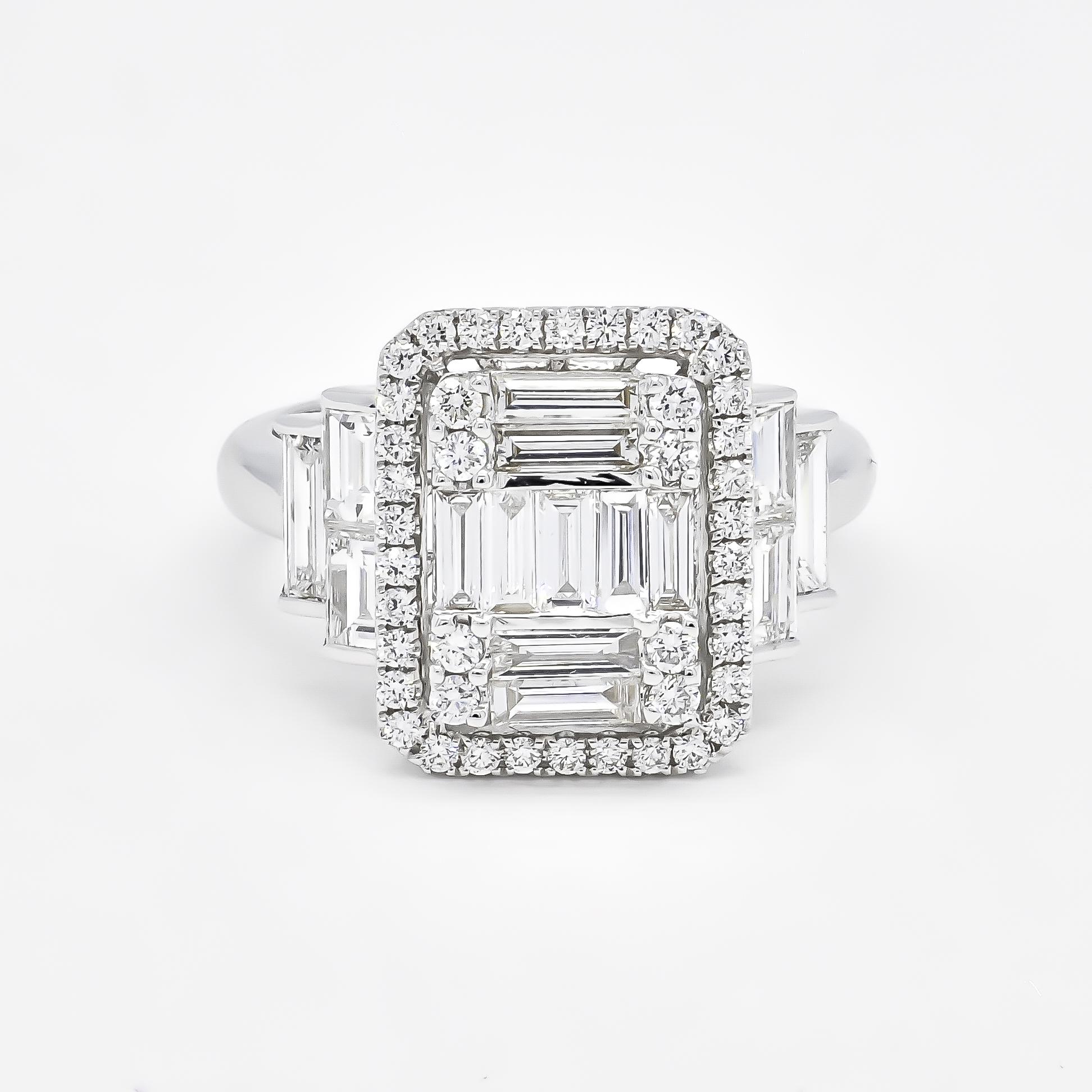 Ultra-modern and gorgeously glam, vow to sparkle with this uniquely elegant baguette and round-cut diamond engagement ring, artistically rendered in 18KT white gold. This stunning ring features a mesmerizing central cluster of baguette and round-cut