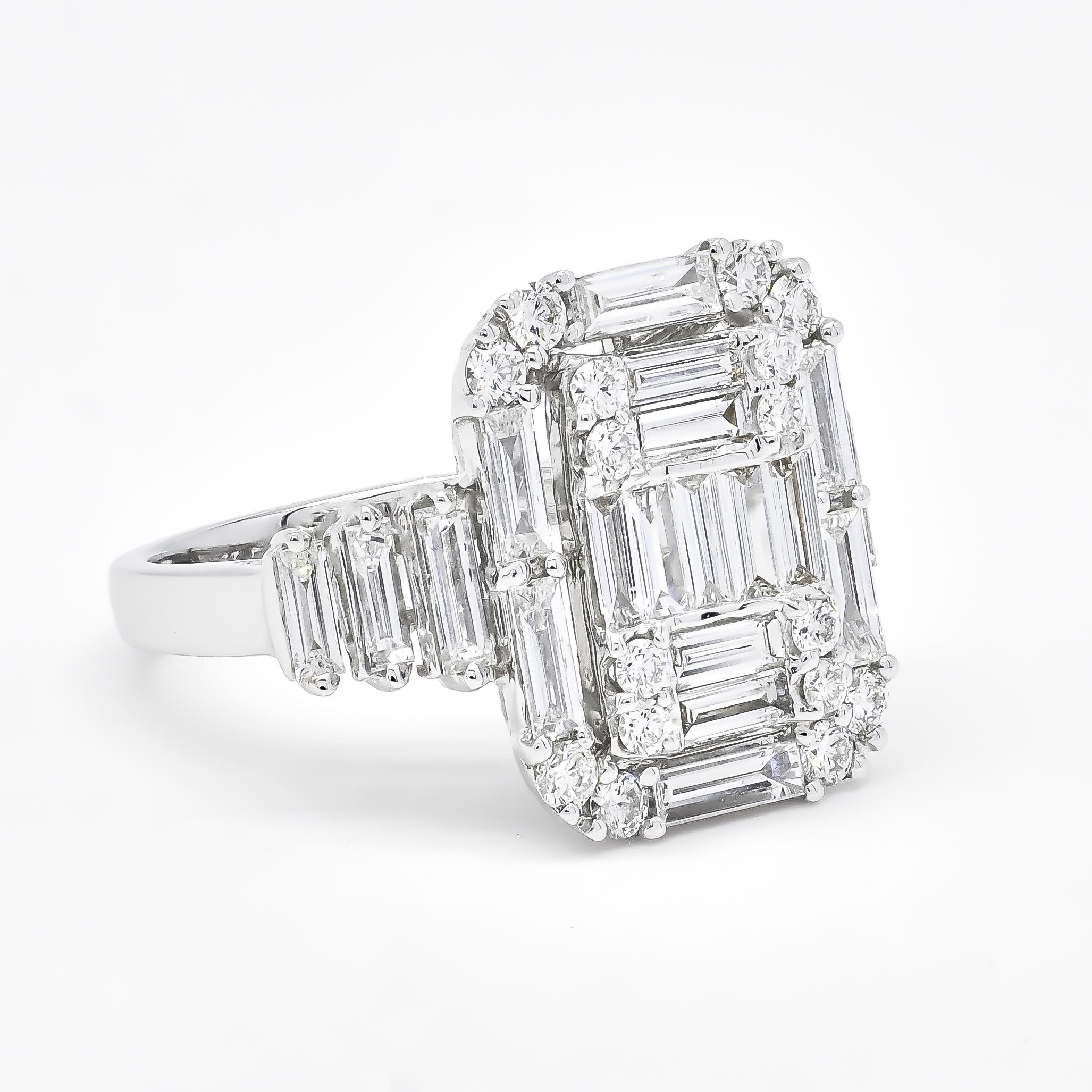 This 18KT White Gold Art Deco Baguette Round Diamond Illusion Step Cut Bridal Ring is luxurious and elegant. The intricate design features a mesmerizing illusion step cut, showcasing the sparkling round diamonds in a stunning baguette setting. 

The