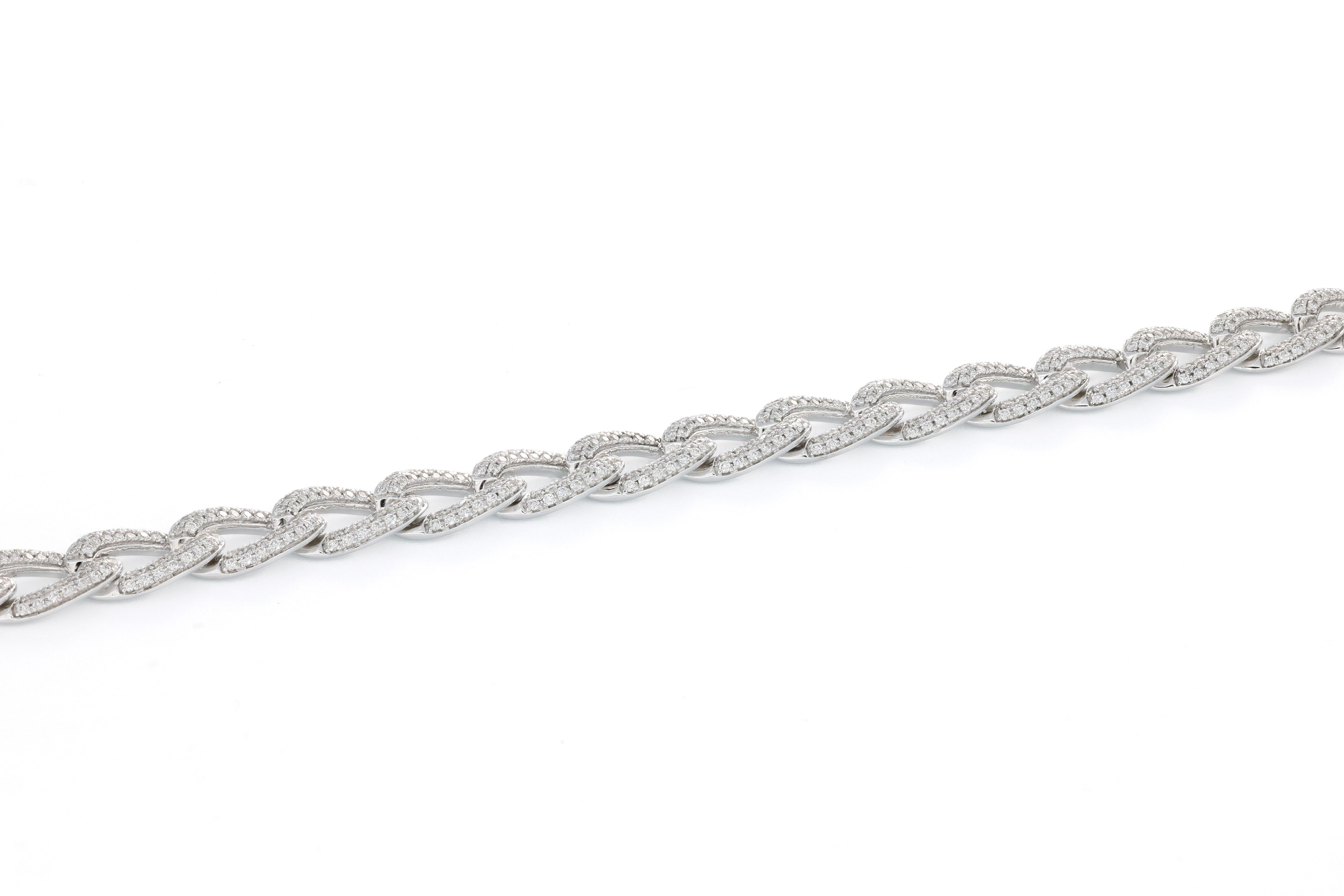 Indulge in the unparalleled luxury of the Natural Diamonds Pave Curb Link Cuban Tennis Bracelet, a truly stunning piece that elevates any jewelry collection. Crafted with meticulous attention to detail, this exquisite bracelet features a striking