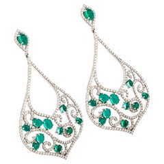 Diamante naturale da 4,76 carati con Labron  smeraldo 8,18cts in oro 14k