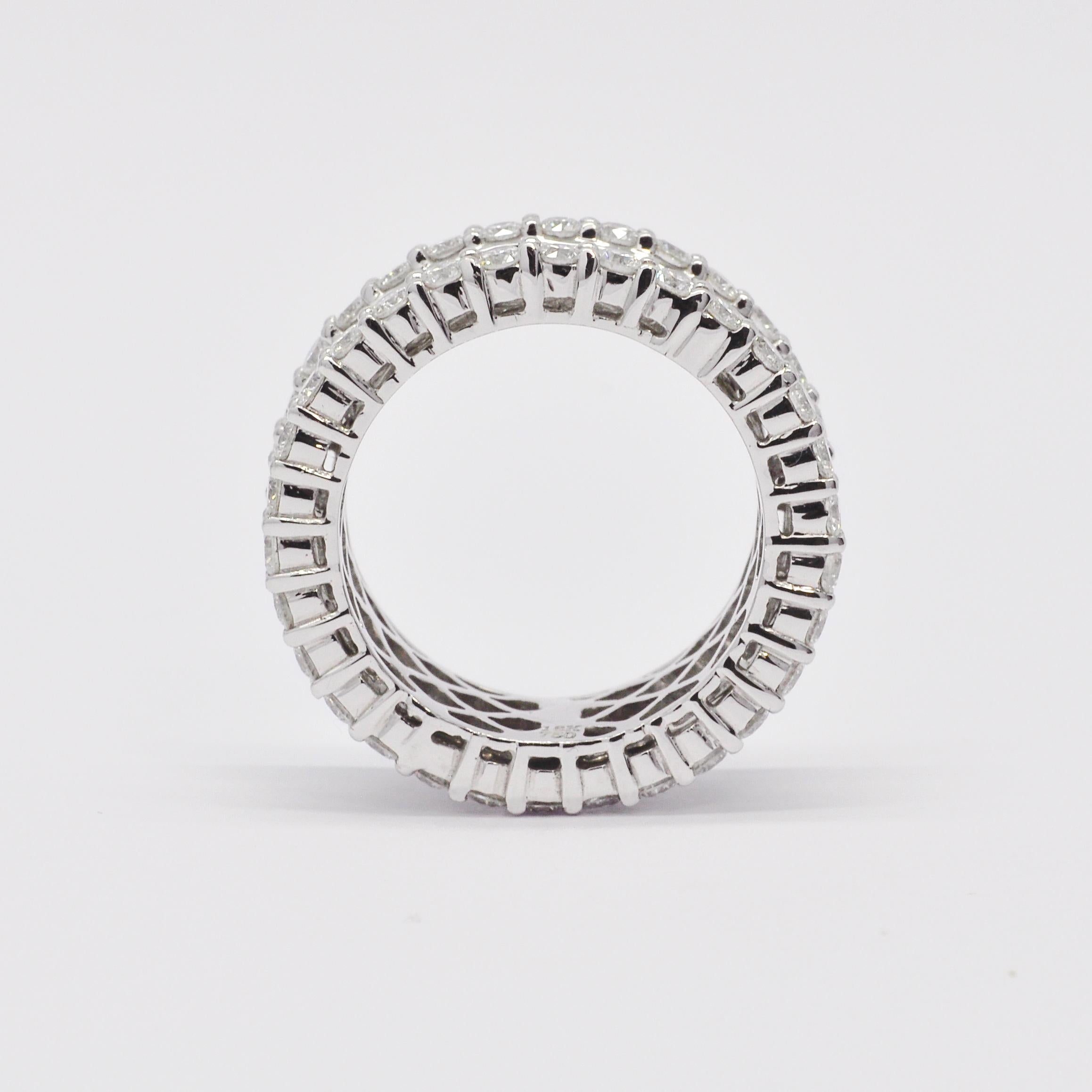Modern Natural Diamond 5.01 carats 18KT White Gold Baguette Full Eternity Band Ring For Sale