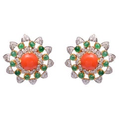 Natural diamond and coral stud earrings in 18k gold