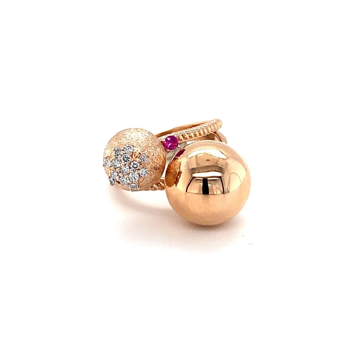 Diamond and Pink Sapphire Rose Gold Cocktail Ring
Super unique cocktail ring!!

Item Specs:
14 Natural Round Cut Diamonds = 0.21 carats (Clarity: SI2, Color: F)
1 Natural Round Cut Pink Sapphire = 0.05 carats
14K Rose Gold = 9.4 grams
Ring size = 7