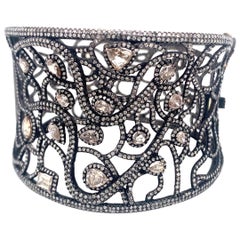 Natural diamond bangle in sterling silver