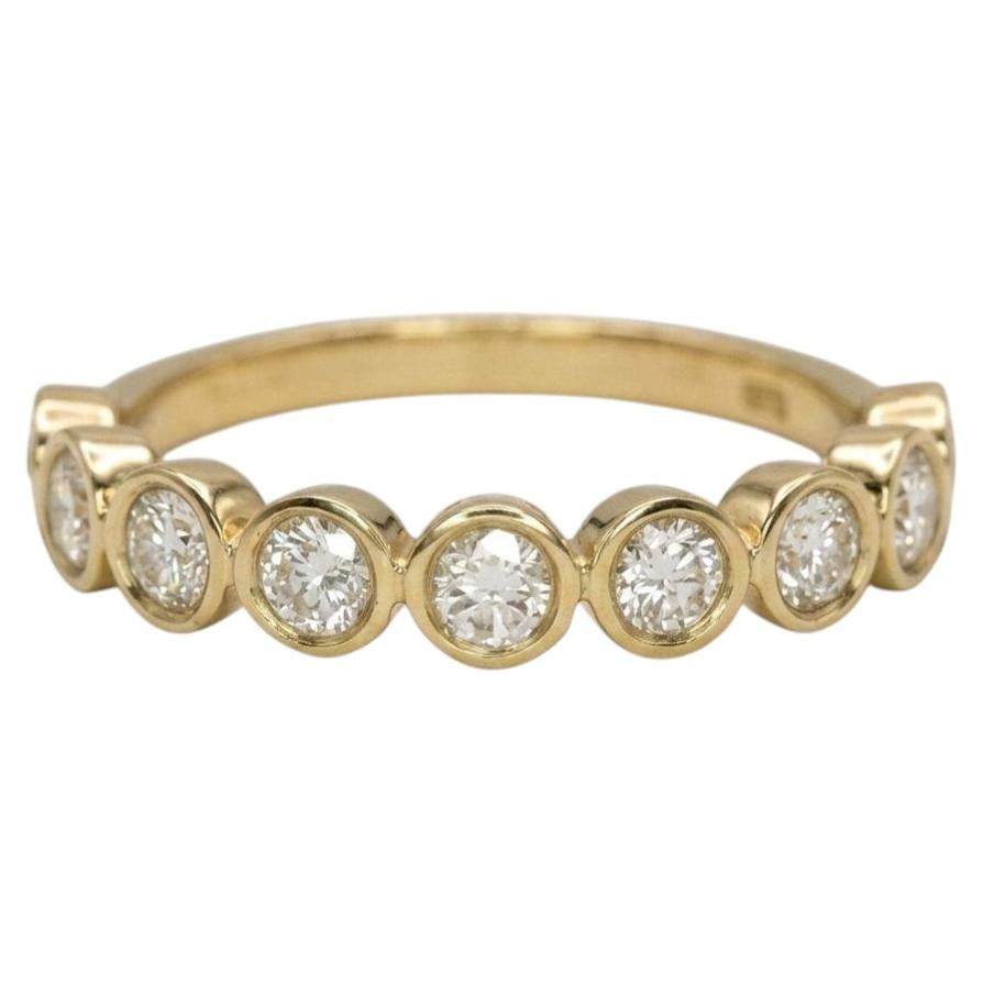 Natural Diamond Bezel Half Eternity Wedding Band in 14k Yellow Gold
