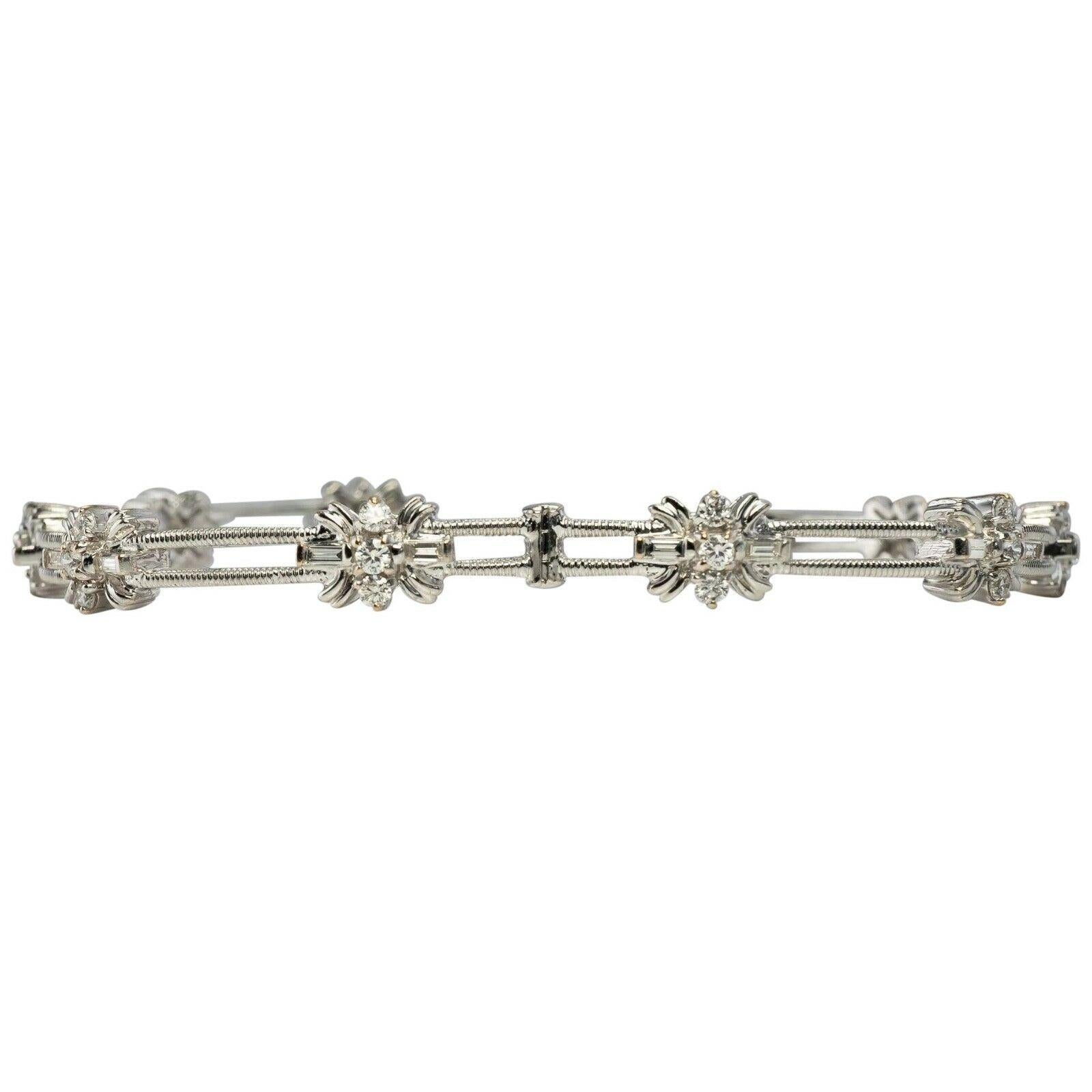 Natural Diamond Bracelet 14K White Gold Flower 1.71 TDW

This beautiful estate bracelet is finely crafted in solid 14K White Gold (carefully tested and guaranteed). 
Each flower-like links holds three round brilliant cut diamonds and two diamond