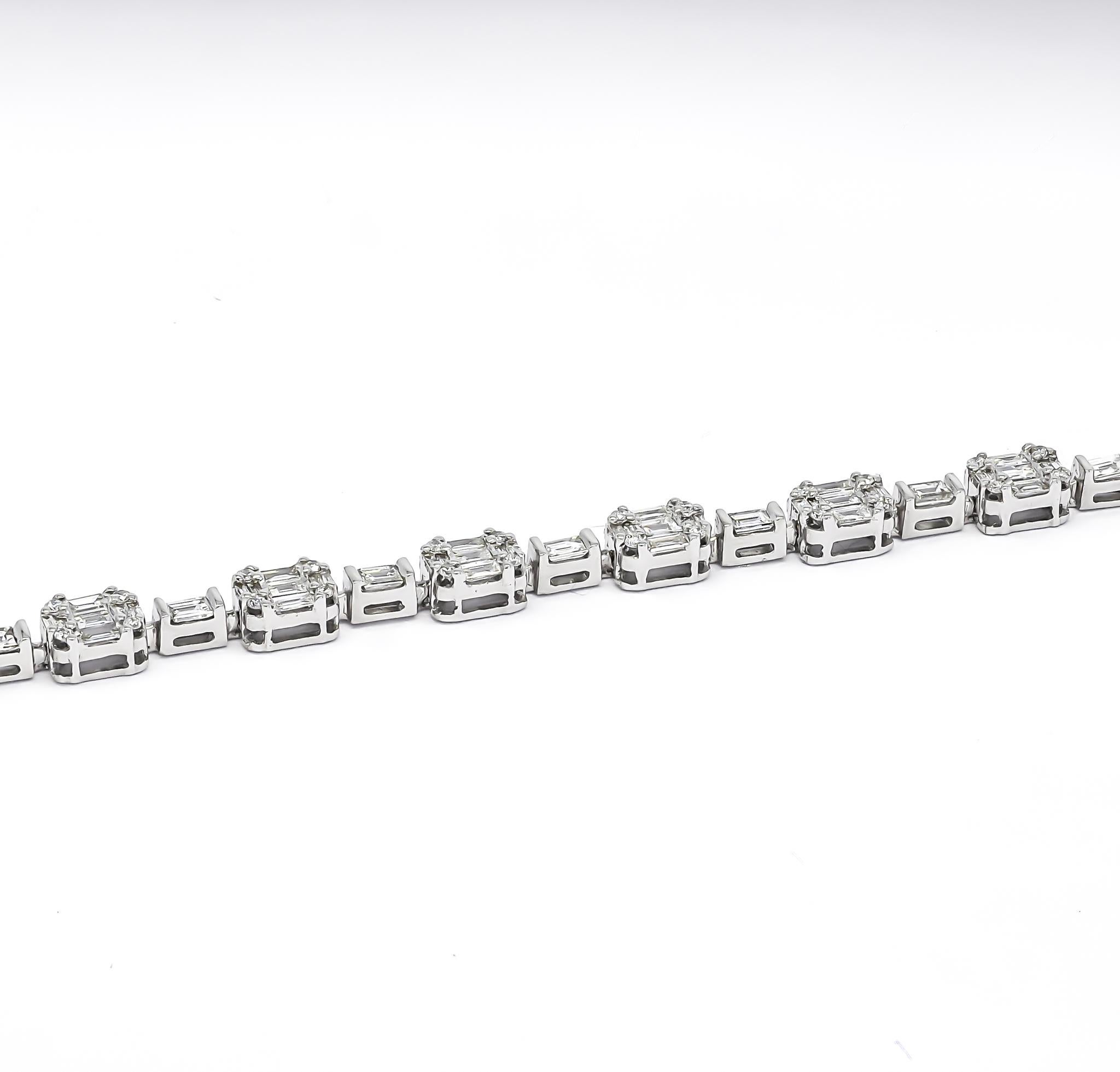 The bracelet showcases an exquisite interplay between the clean lines of the baguette diamonds and the scintillating brilliance of the round diamonds, creating a stunning visual effect that's both modern and timeless. The baguette diamonds form a