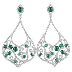 Orecchini con diamante naturale e smeraldo sintetico in oro 14k