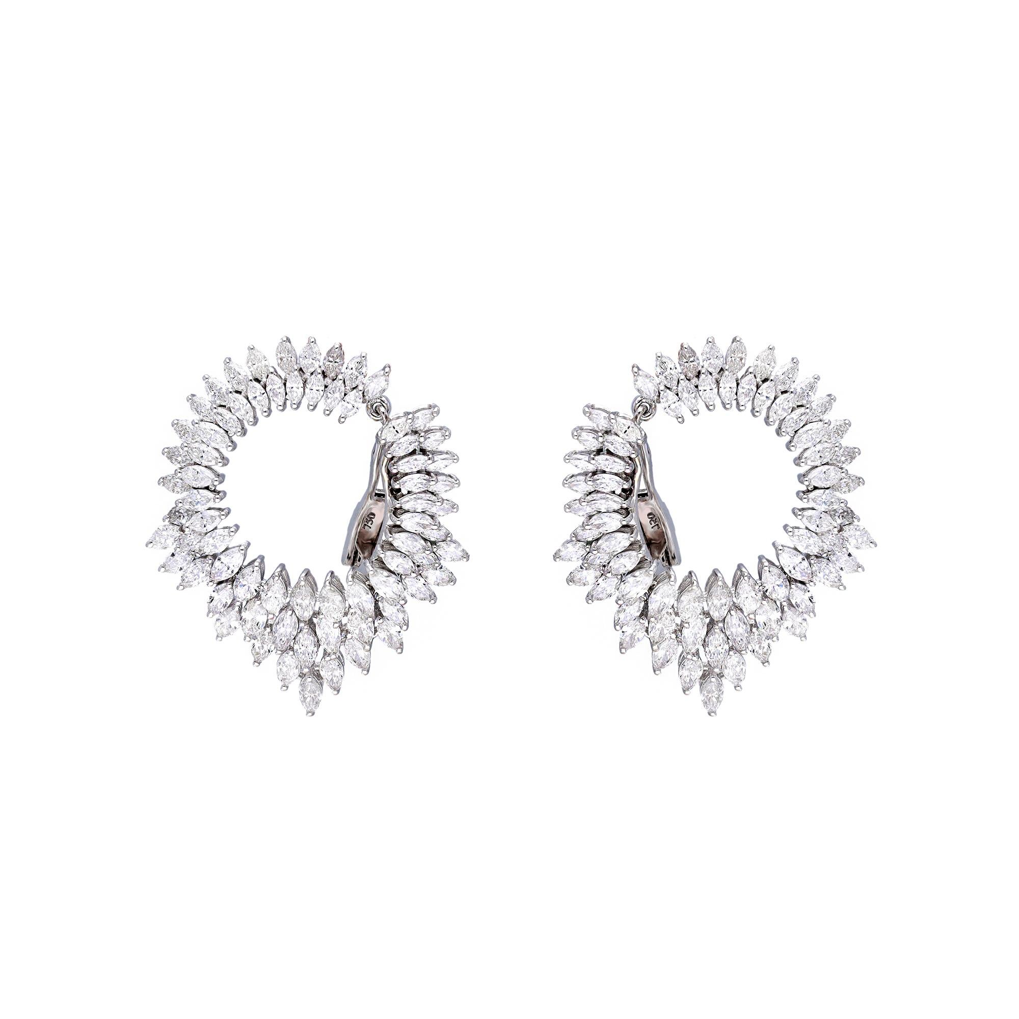 This is a natural  Diamond Earring with Diamond in 18k gold. The are very high quality and very good quality diamonds the clarity is vsi and G colour

Diamond : 7.73 carats
gold : 13.764 gm

This is a brand new piece

. Its very hard to capture the