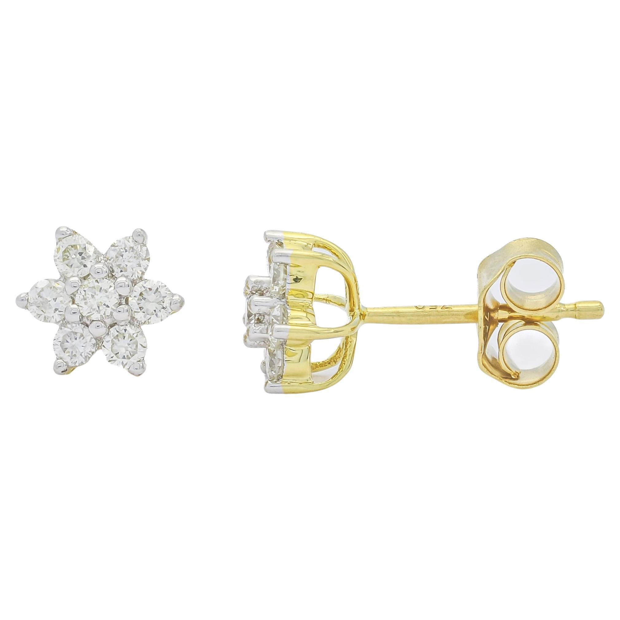 The combination of 18Kt yellow gold and a minimalist natural diamond flower shape cluster design creates a sophisticated and versatile accessory. 

The understated beauty of such earrings makes them suitable for various occasions, whether it's a
