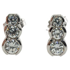 Orecchini con diamanti naturali in oro bianco 14k .90 TDW Tre pietre
