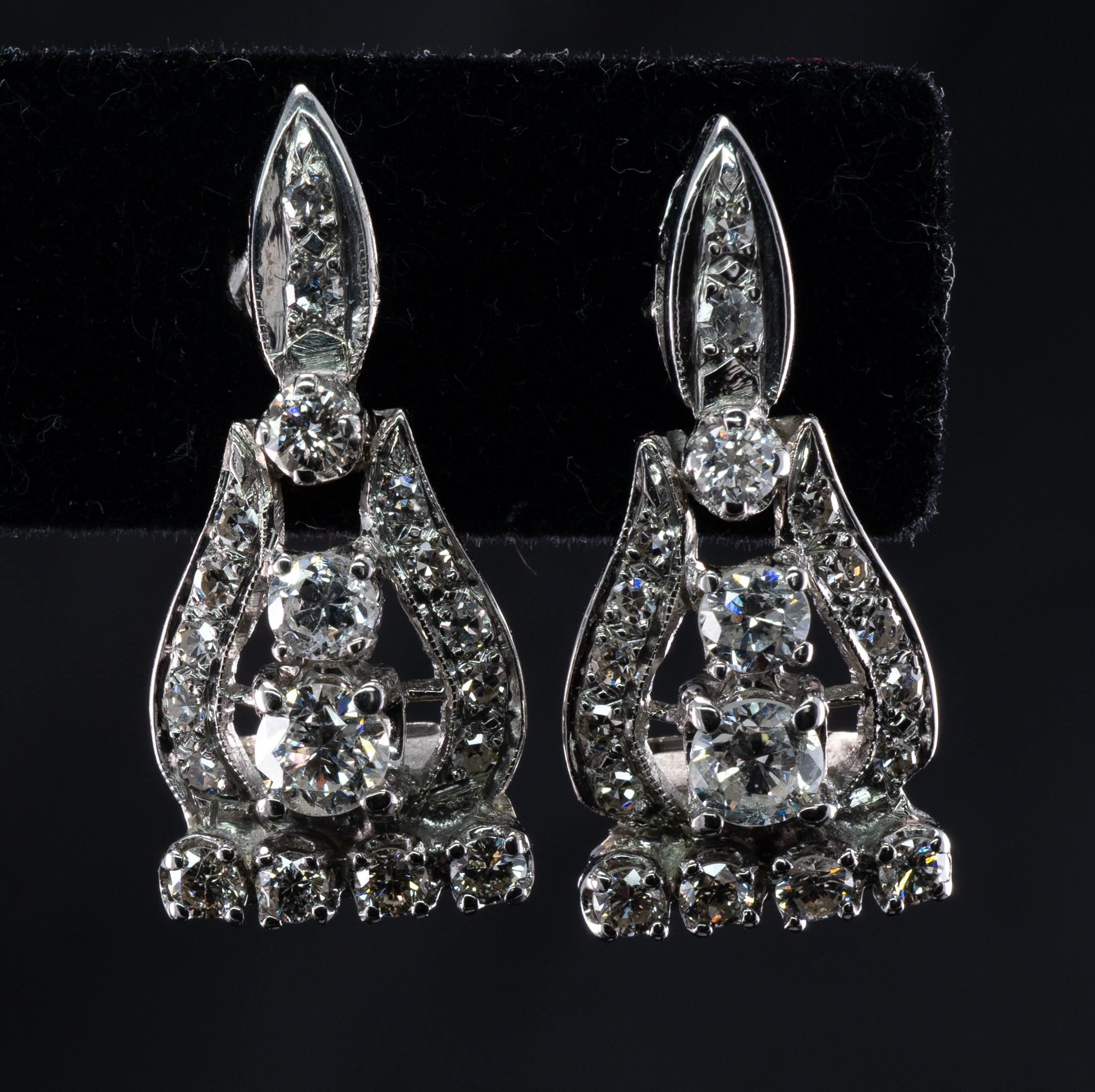 Natural Diamond Earrings Drop 14K White Gold 1.72 ct 

These vintage earrings are crafted in solid 14K White Gold (tested and guaranteed).
Each earring holds 19 round and singe cut diamonds.
The larger diamond is .23 carat and the smallest is 0.015