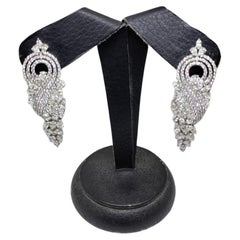 Natural diamond earrings with 7.20 carat diamond in 18k
