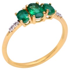 Bague en or 18k avec diamant naturel et émeraude