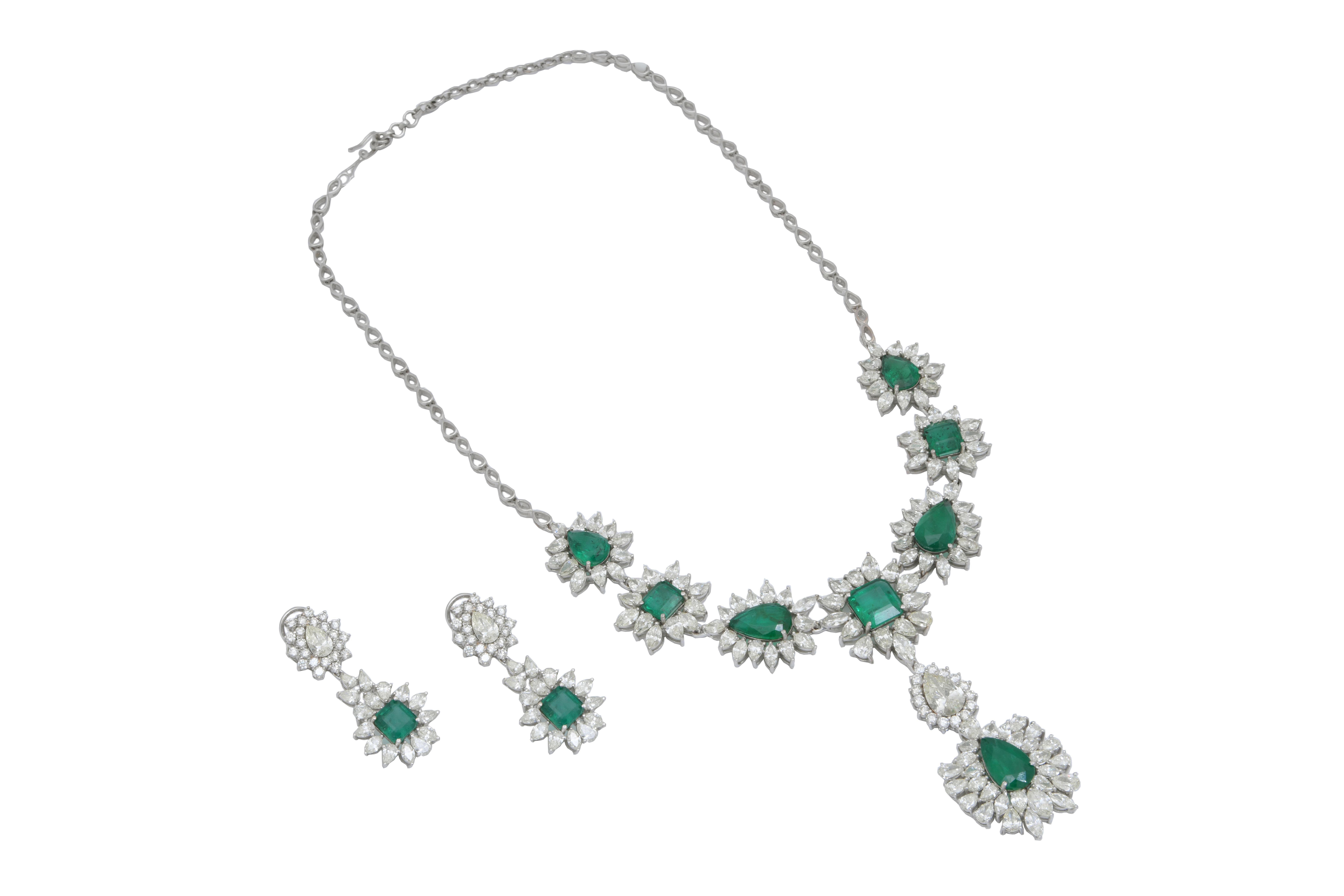 This is an amazing necklace set with 

Diamonds : 36.29 carats
Emerald : 28.530 carats

Gold : 43.826gms






It's a perfect necklace set for a party wear. the quality of Diamonds are FG colour and vsi purity


 . Please read my reviews to make