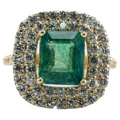 Natürlicher Smaragdring mit rechteckigem Diamantschliff aus 18 Karat Gold