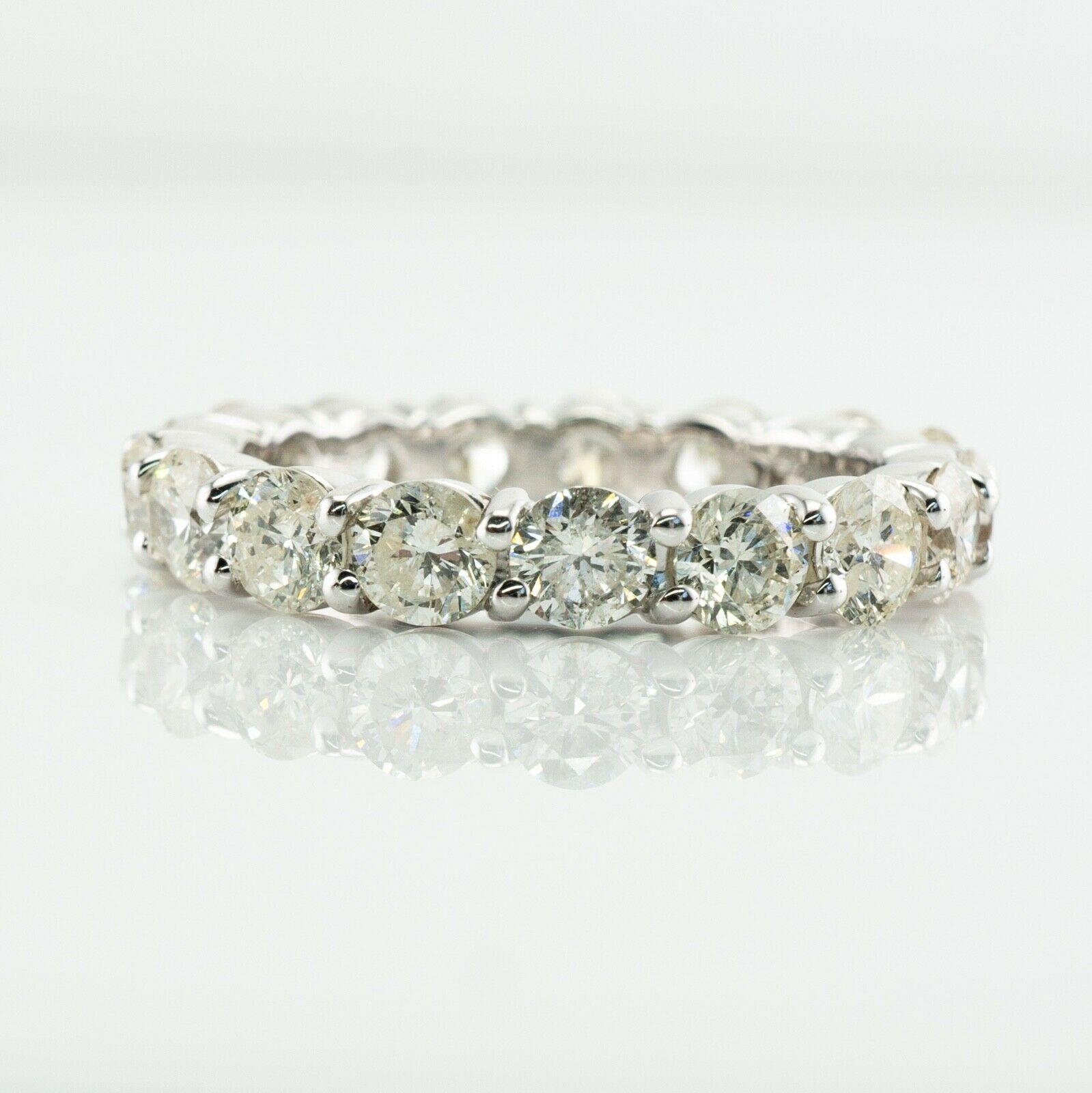 Bague d'éternité en or blanc 14K diamant naturel 3.40 TDW sz. 7

Cette magnifique bague de succession est finement fabriquée en or blanc massif 14K (soigneusement testé et garanti). 
17 diamants ronds de taille brillante font le tour, sans début ni