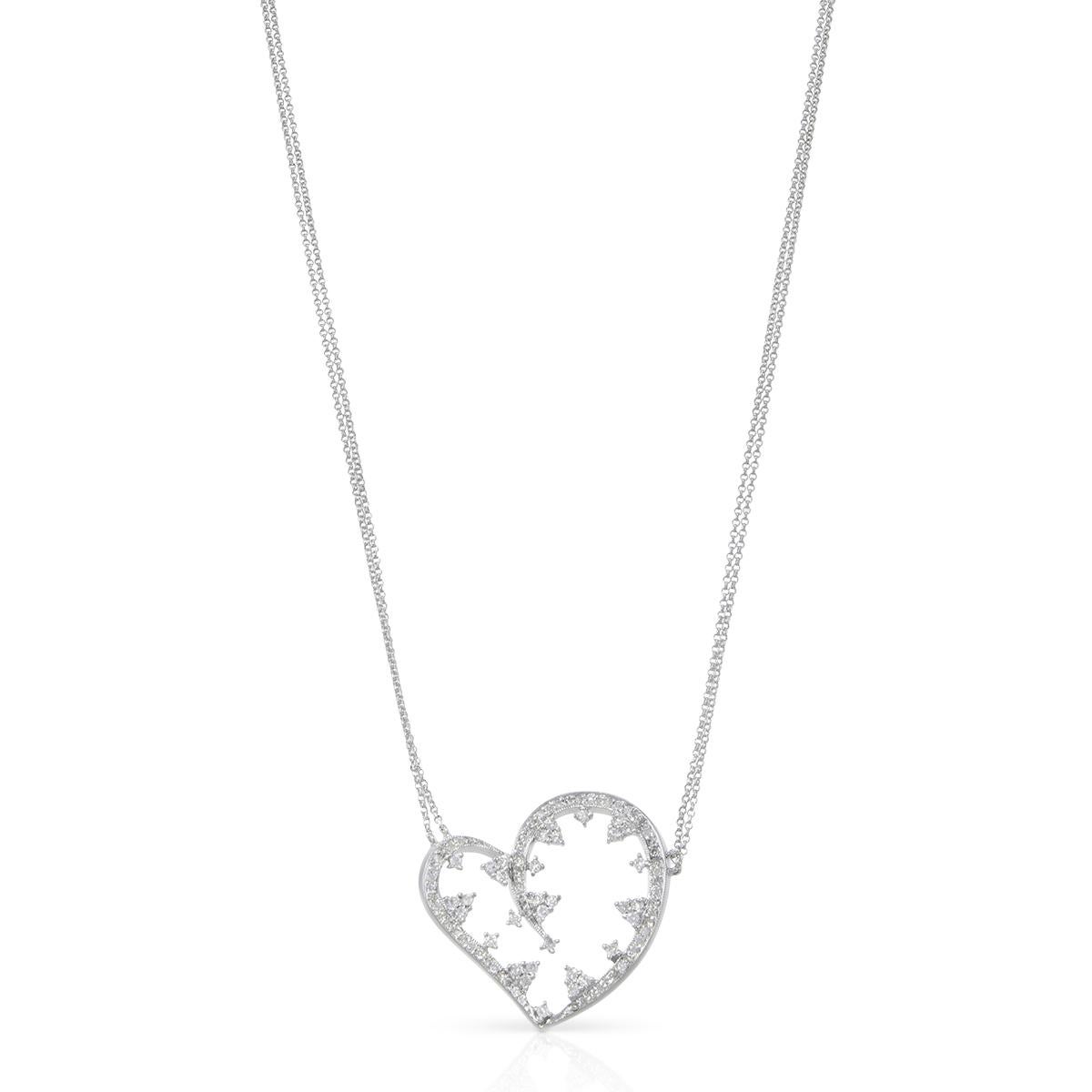 This classic natural diamond heart pendant showcases white sparkling round cut diamonds in a heart-shaped design. Each diamond is of SI1-SI2 clarity and G-H color. Total diamond weight: 1.50cts. This piece would make the perfect anniversary,