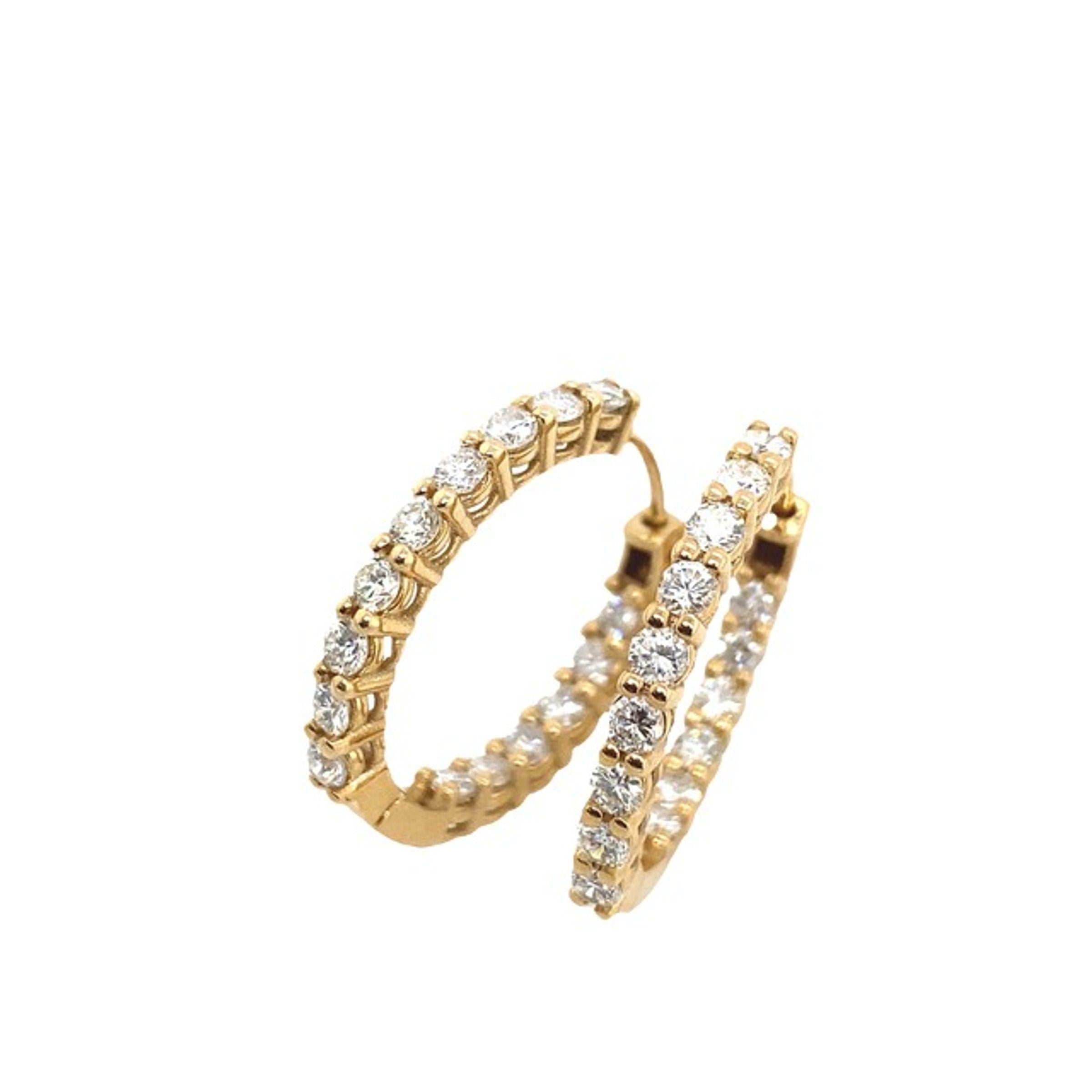 This pair of hinged hoop earrings was designed to be the perfect everyday earring.
It features a total of 1.80ct Diamonds mounted on a 14ct Yellow Gold hoop.
It is hinged, allowing it to swing from the ear.

Additional Information:
Earrings
