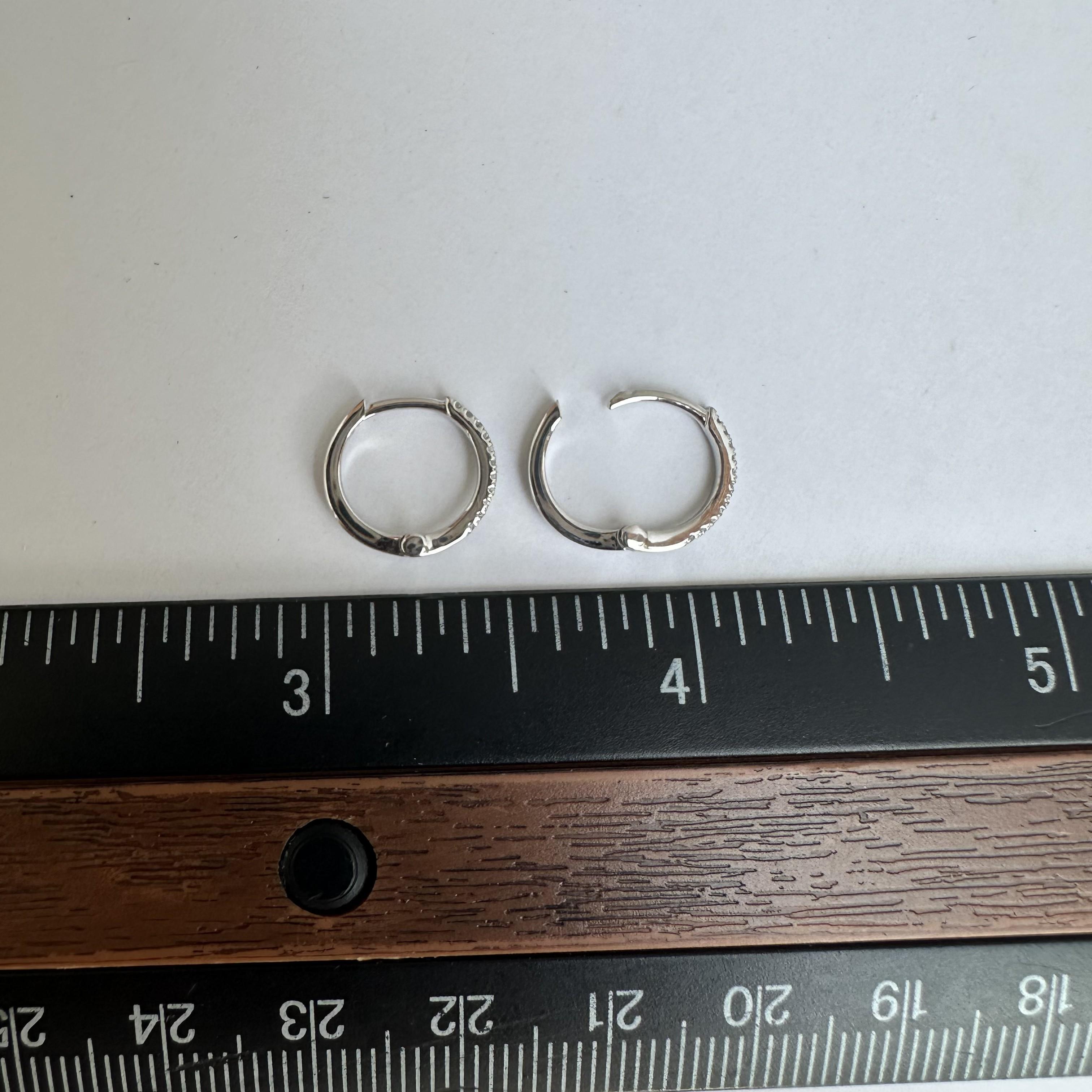 Natural Diamond Huggie Earrings in 14kt White Gold - 0.08ctw Diamonds, New In New Condition For Sale In West Hempstead, NY