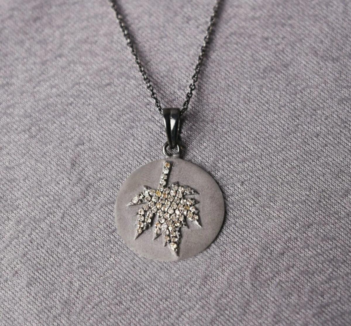 Natural Diamond Maple Leaf 925 Sterling Silver Circle Pendant Minimalist Pendant


Base Metal
Sterling Silver, 925 parts per 1000
Diamond Weight
0.36 cts Approx
Metal
Sterling Silver
Main Stone Shape
Round
Pendant Shape
Circle
Length (inches)
16