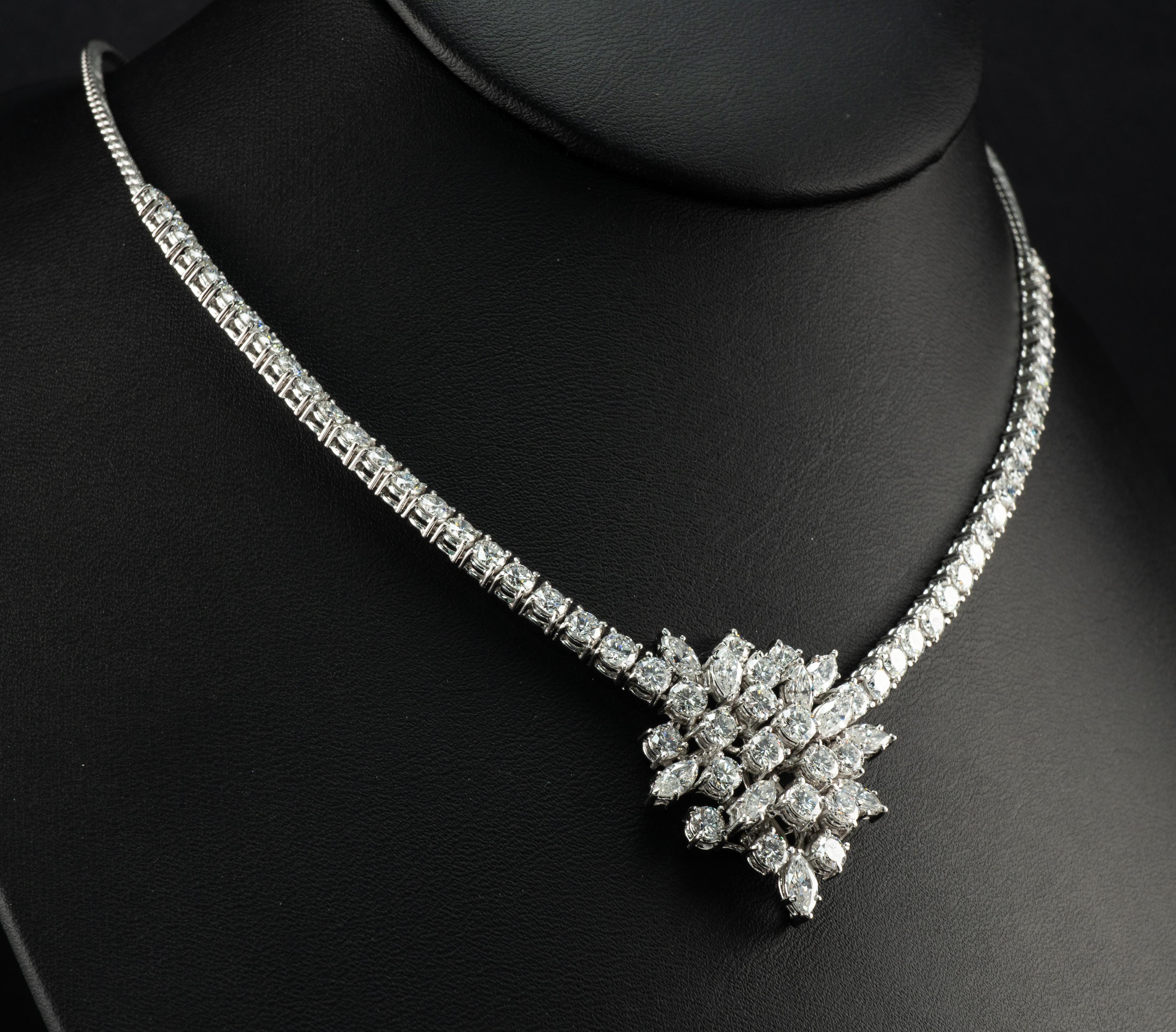 Natural Diamond Necklace Choker Vintage 14K White Gold 9.52 TDW

This necklace is made in solid 14K White Gold and set with natural genuine diamonds.
The center presentation is set with 16 round brilliant cut diamonds and 10 marquise cut diamonds