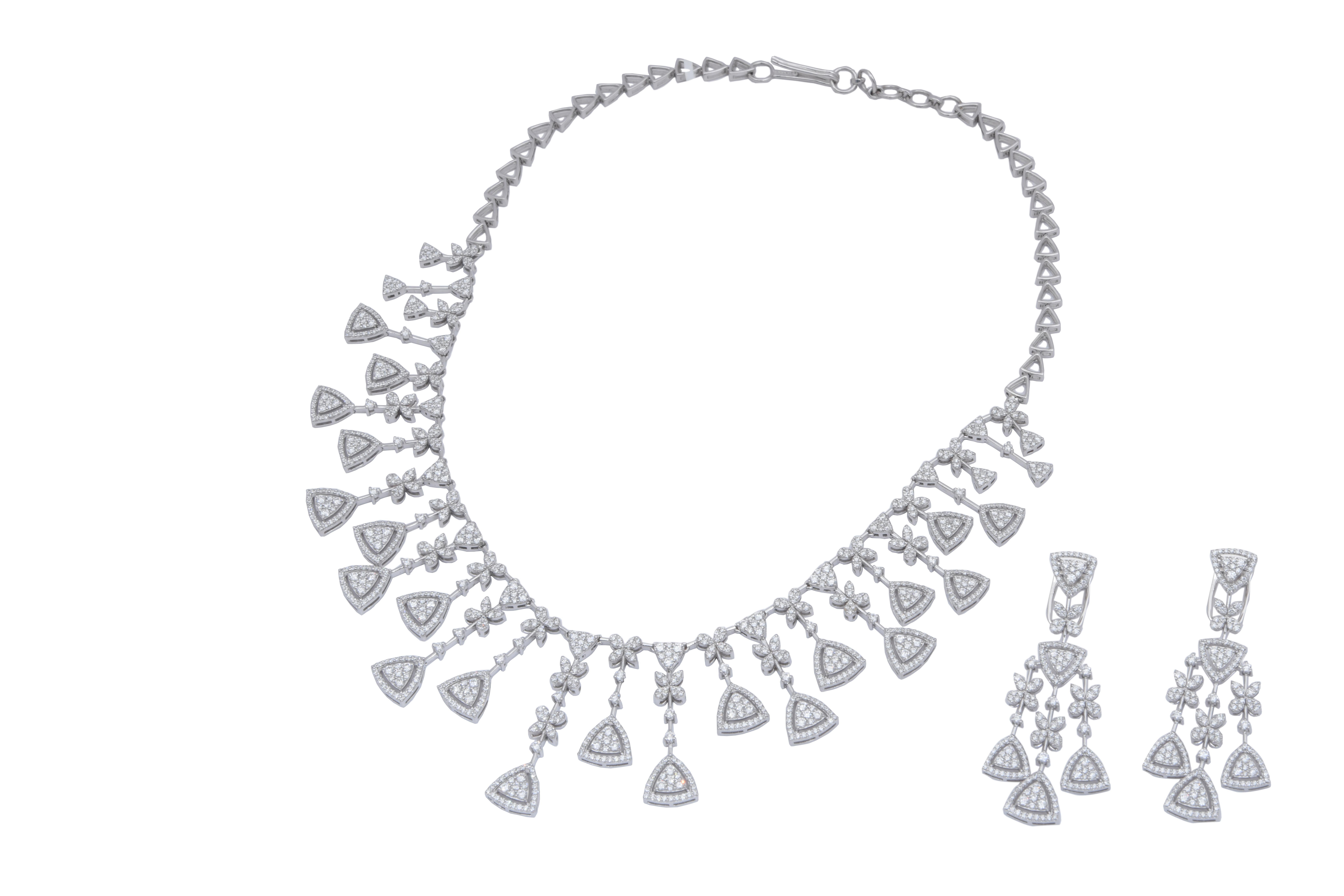 This is an amazing necklace set with 

Diamonds : 11.70 carats

Gold : 62.05gms






It's a perfect necklace set for a party wear. the quality of Diamonds are FG colour and vsi purity


 . Please read my reviews to make yourself comfortable.