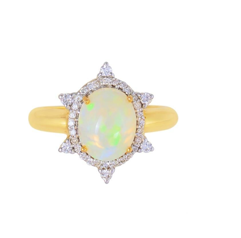 Questo anello è realizzato in oro giallo 14 carati e presenta una gemma opale. L'anello è semplice ed elegante e sarebbe un'ottima aggiunta a qualsiasi collezione di gioielli.

Specifiche

Dimensioni: Lunghezza: 1.7 cm, Larghezza: 1.3 cm
Peso lordo: