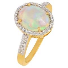 Anello con diamante naturale e opale in oro 14K