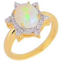 Anello con diamante naturale e opale in oro 14K
