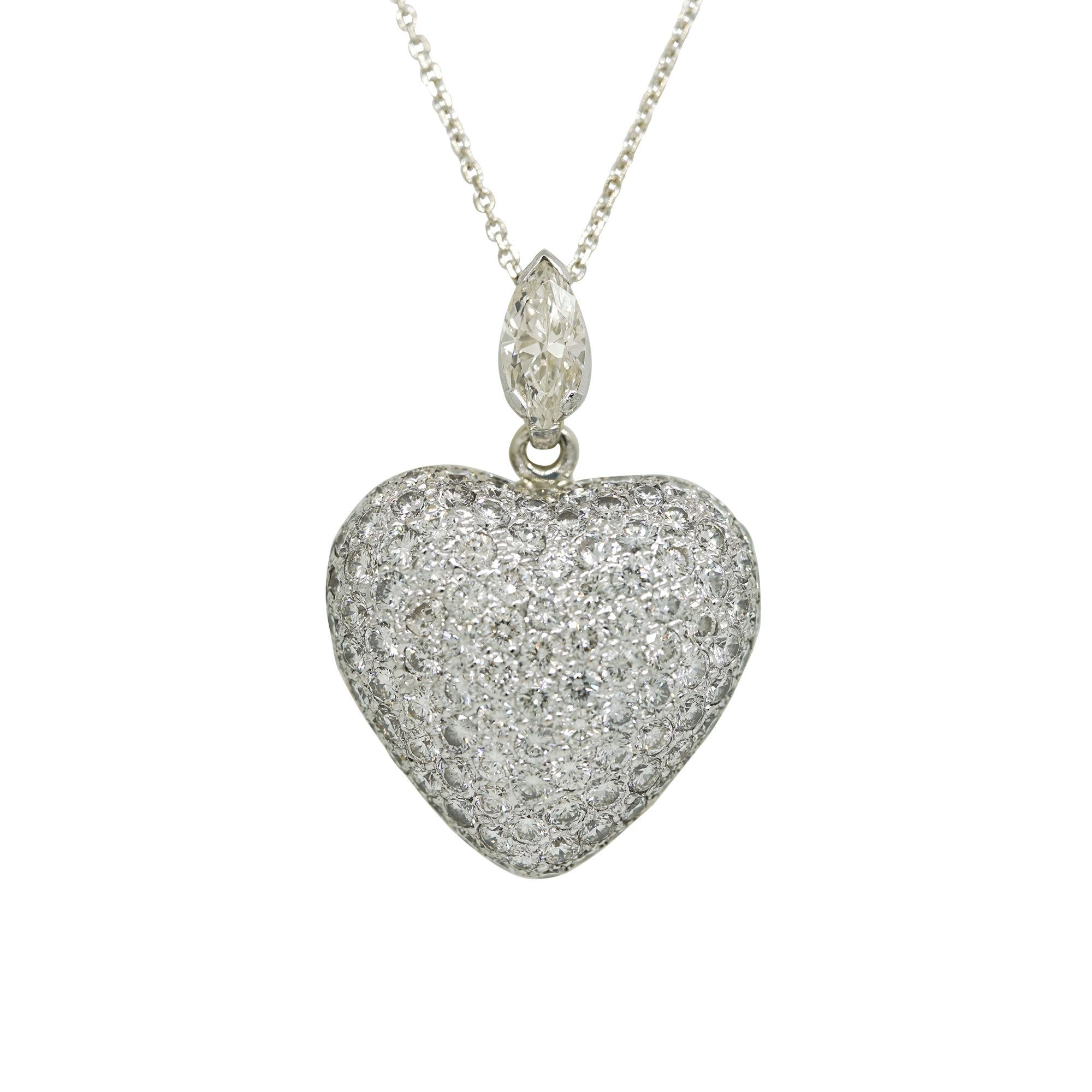 Natural Diamond Pave & Marquise Cut Diamond 18 Karat Heart Pendant In Stock

This natural round brilliant-cut pave diamond heart necklace is a larger look for anyone who loves jewelry. With a good amount of bling and an additional marquise-cut