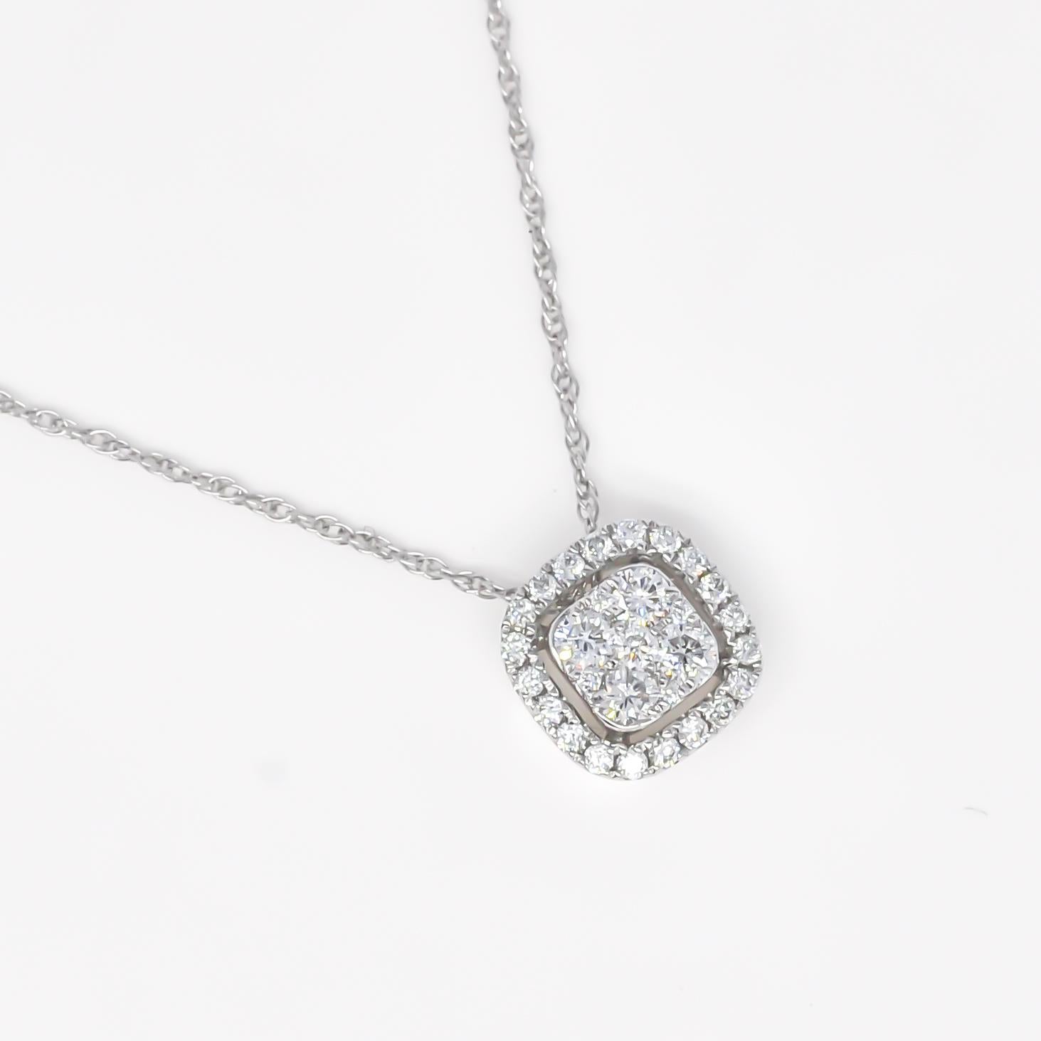 Elevate your jewelry collection with this captivating 18KT White Gold Round Diamonds Square Cluster Halo Illusion Pendant Necklace. 

With a total diamond weight of 0.30 carats, this pendant necklace offers a perfect balance of understated elegance