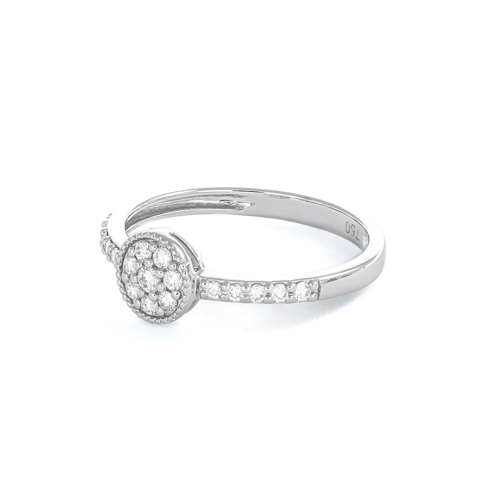 This minimalist white diamond ring embodies understated elegance with its simple cluster set design and accented shanks, making it an ideal choice for both everyday wear and thoughtful gifting.

With a total carat weight of 0.27, the diamonds are
