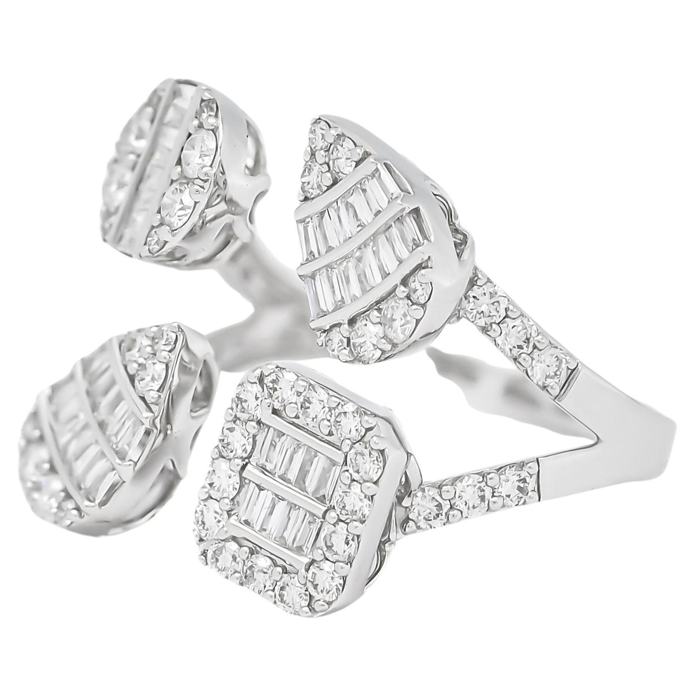 Dazzling round shape diamonds form a spectacular clusters in this stunning white gold 4 cluster ring in 4 shank. The Cluster are in a shape of a Heart, Pear and a Round Diamond, giving an illusion of solitaire Diamonds.

Indulge in the epitome of