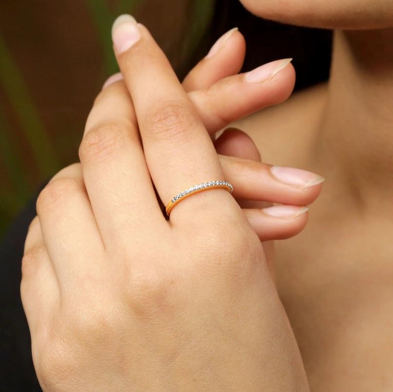 This ring is made with 14k white gold and 14k yellow gold also and set with brilliant sparkle diamonds. Stay subtle and classy with Jeypore's Diamond Rings that will provide you both, over-the-top and a minimal look! 

Specifications:

Dimensions: 