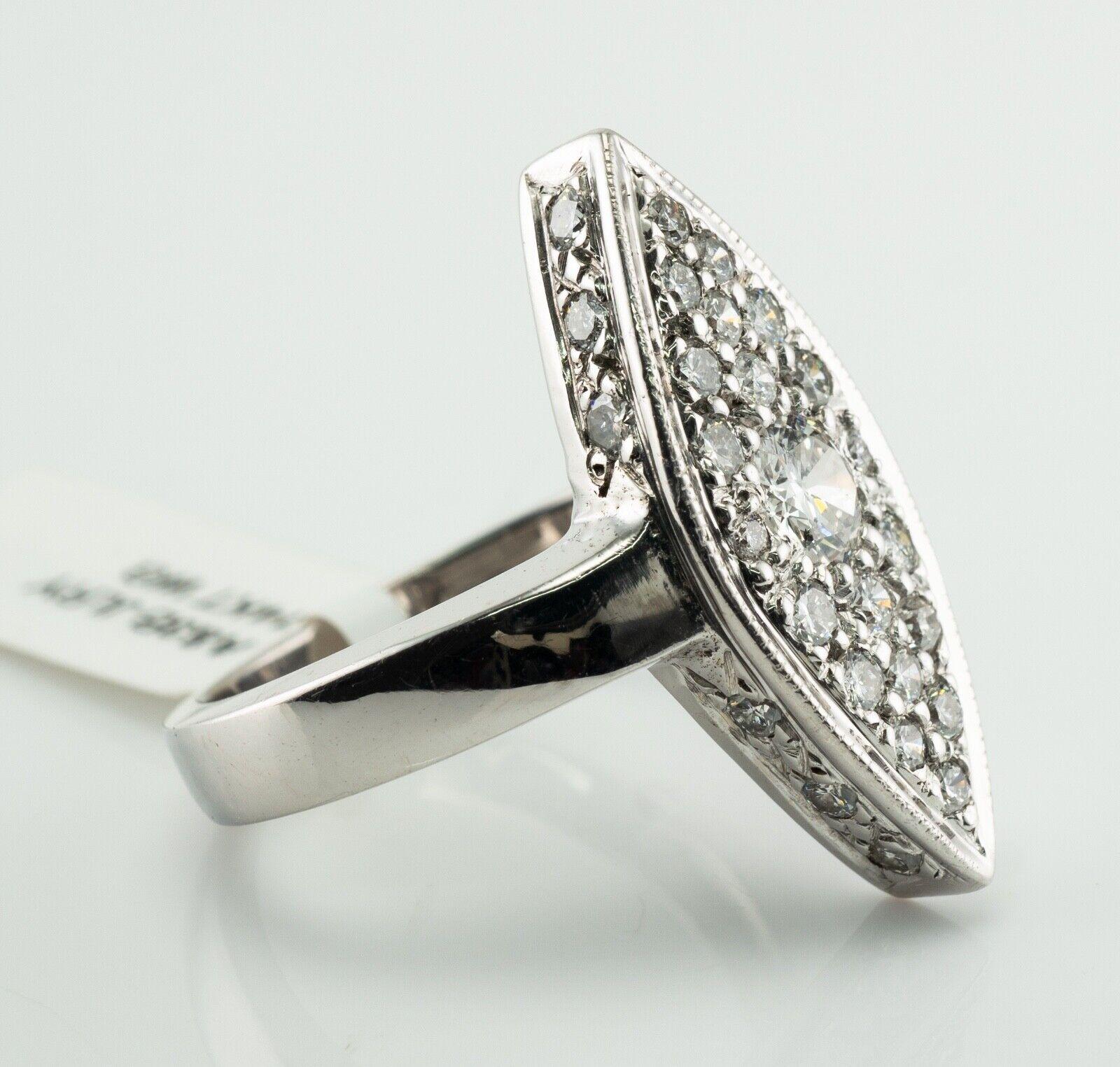 Natürlicher Diamantring 14K Weißgold Vintage Marquise Form

Dieser Vintage-Ring ist aus massivem 14K Weißgold gefertigt (sorgfältig geprüft und garantiert).
Es hat immer noch eine $ 3480 Tag aus Nachlass-Auktion.
Der runde Diamant im Brillantschliff