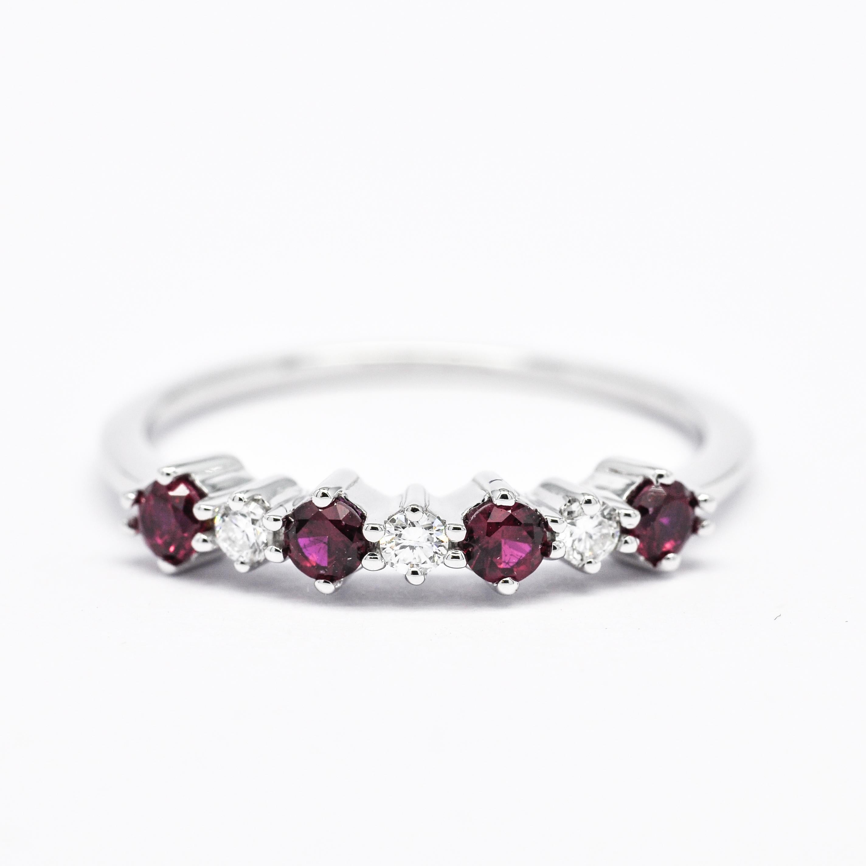The addition of Synthetic Red Color Rubies and Diamonds 18kt White Gold Ring enhances its allure and symbolism, making it an even more enchanting choice for both engagement and anniversary purposes.

The synthetic ruby red color, symbolizing