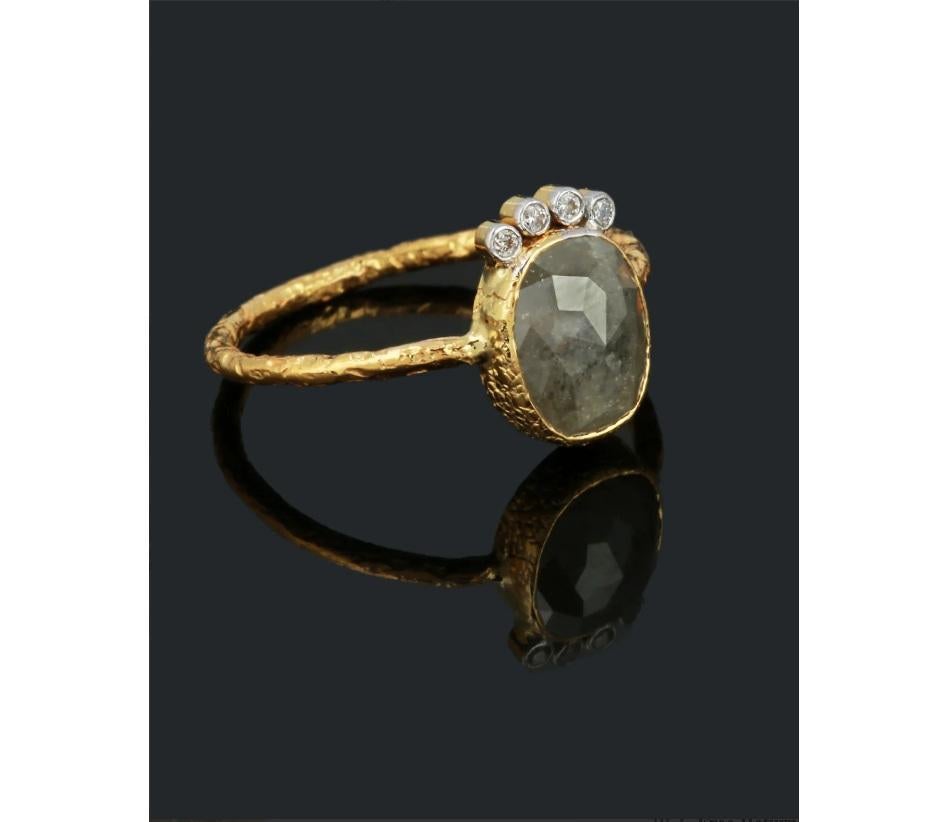 Natural beauty never looked this good! The stellar crystal is encrusted with three delicate 0.69-carat natural diamonds and set in 18K yellow gold is a timeless masterpiece of jewelry!

Specifications:

Dimensions: Ring Size-7.25, Top-11*10 MM
Gross