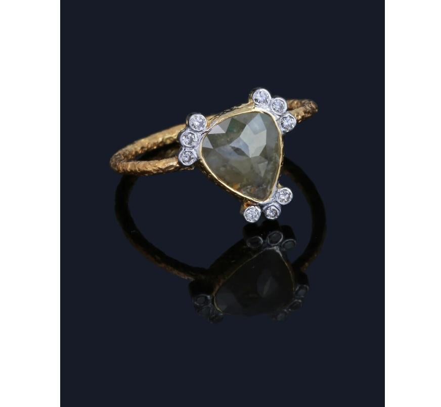 This ring is made of solid 18k yellow gold and set with natural rose cut diamonds. The diamonds have a beautiful texture that makes them sparkle.

Specifications:

Dimensions: Ring Size-7.25, Width-12*11 mm
Gross Weight: 2.290 gms
Gold Weight: 1.998