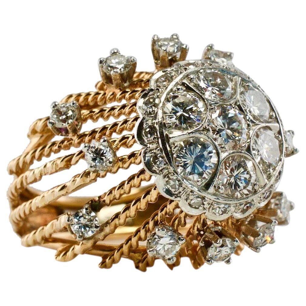 Natural Diamond Ring 18K Gold Vintage Cocktail Vintage

This gorgeous vintage ring is finely crafted in solid 18K Yellow Gold (carefully tested and guaranteed) and set with white and sparkly diamonds.
Center seven round brilliant cut diamonds are in