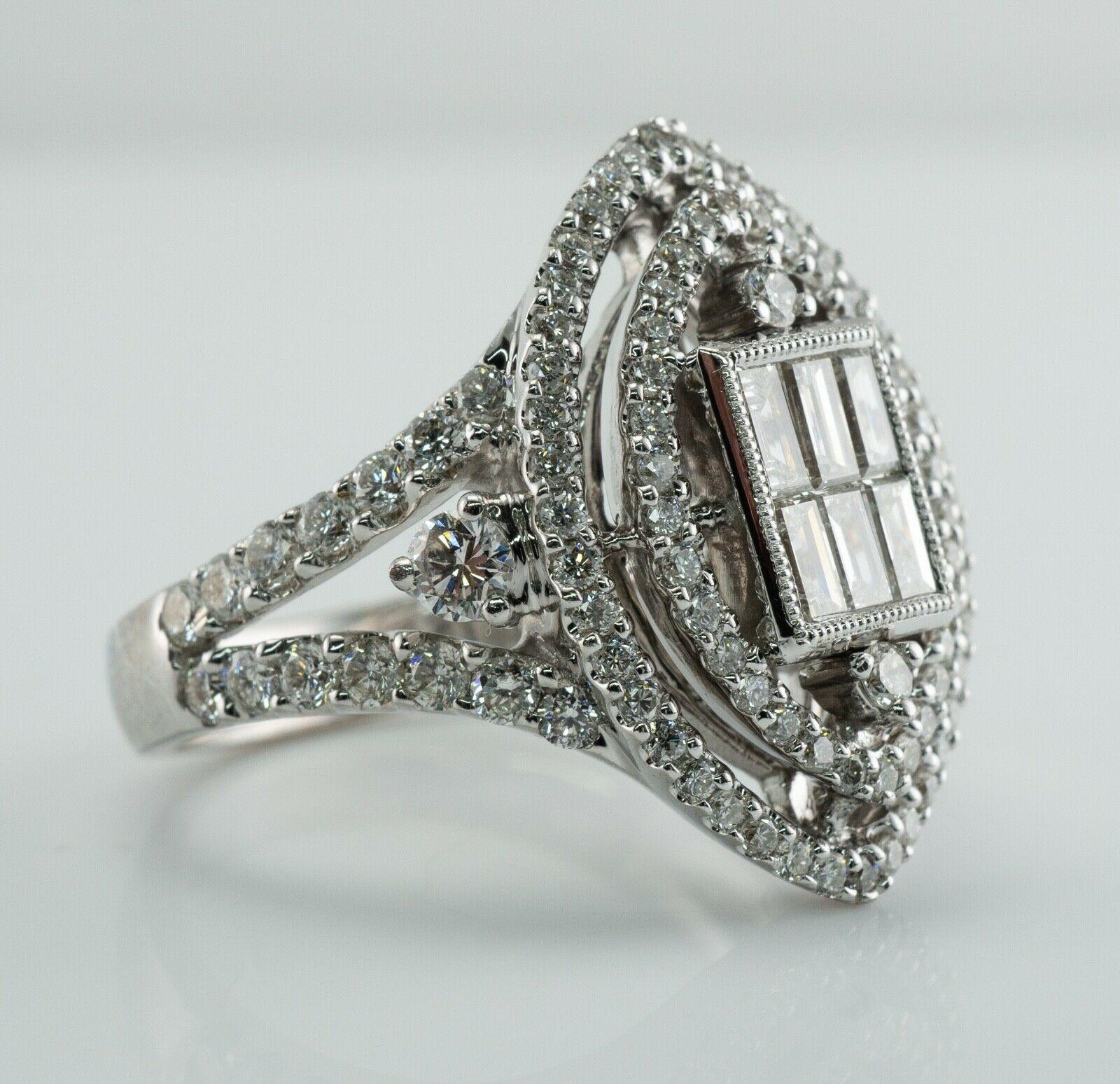 Natural Diamond Ring 18K White Gold 1.87 TDW Cocktail Engagement

This beautiful estate ring is crafted in solid 14K White Gold. 
Six rectangular cut diamonds total .60 carat of VS2-SI1 clarity and H color.
There are 98 round cut diamonds from .01