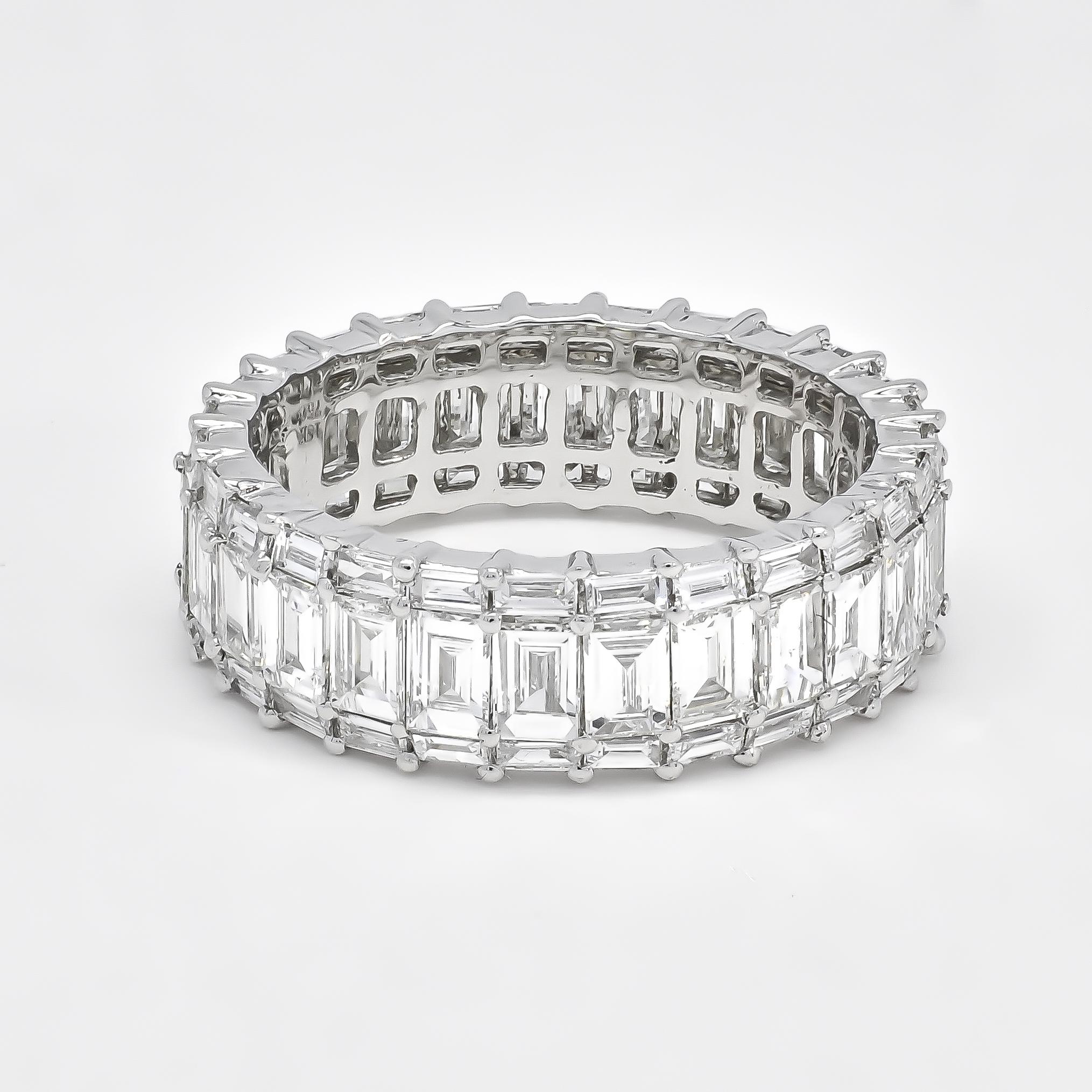 Behold the exquisite craftsmanship of this remarkable ring, where sophistication meets brilliance in perfect harmony. An elegant procession of baguette diamonds, totaling 3.80 carats, takes center stage, casting a mesmerizing glow that captures the