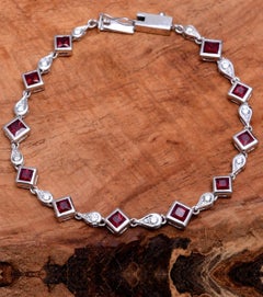 Pulsera de diamantes naturales y rubíes en oro de 18 quilates