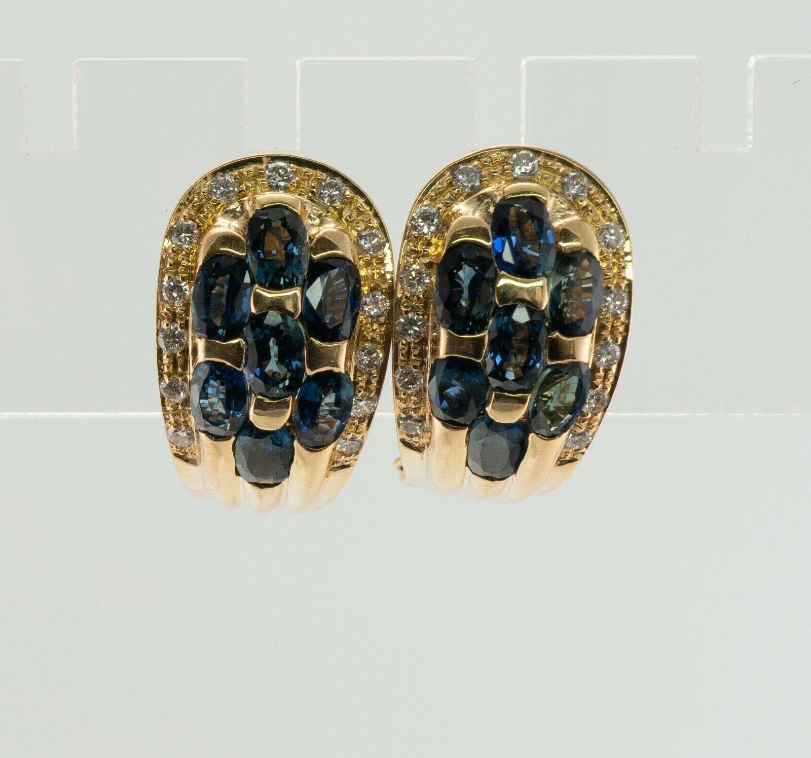Natural Diamond Sapphire Earrings 18K Gold Omega Backs

These designer earrings are crafted in solid 18K Yellow Gold with 14K Gold posts.
Each earring is set with 7 natural oval cut blue Sapphires = 3.92 carats for the pair.
These sapphires are a