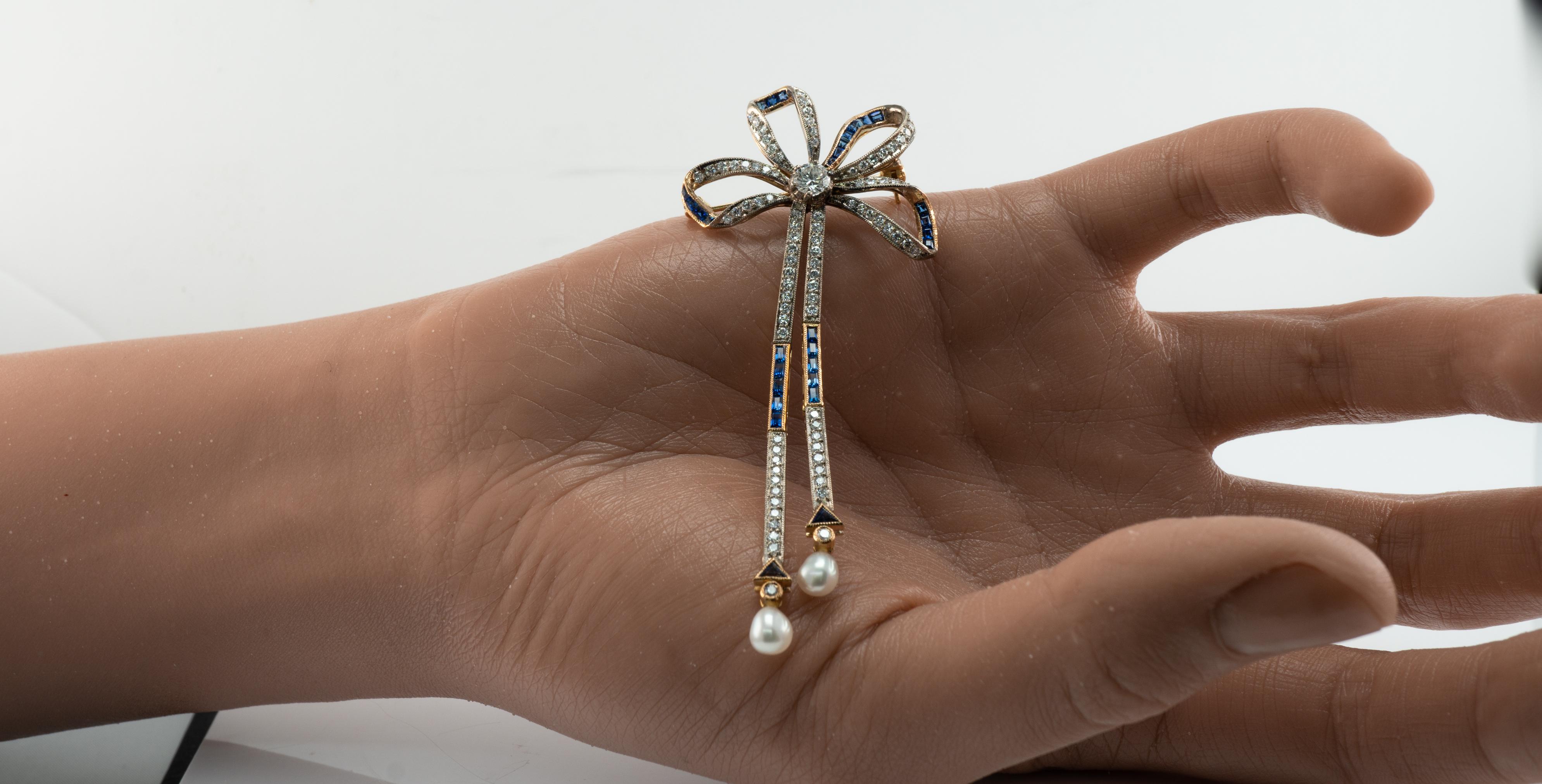 Round Cut Natural Diamond Sapphire Pearl Brooch Bow Ribbon 18K Gold Vintage For Sale
