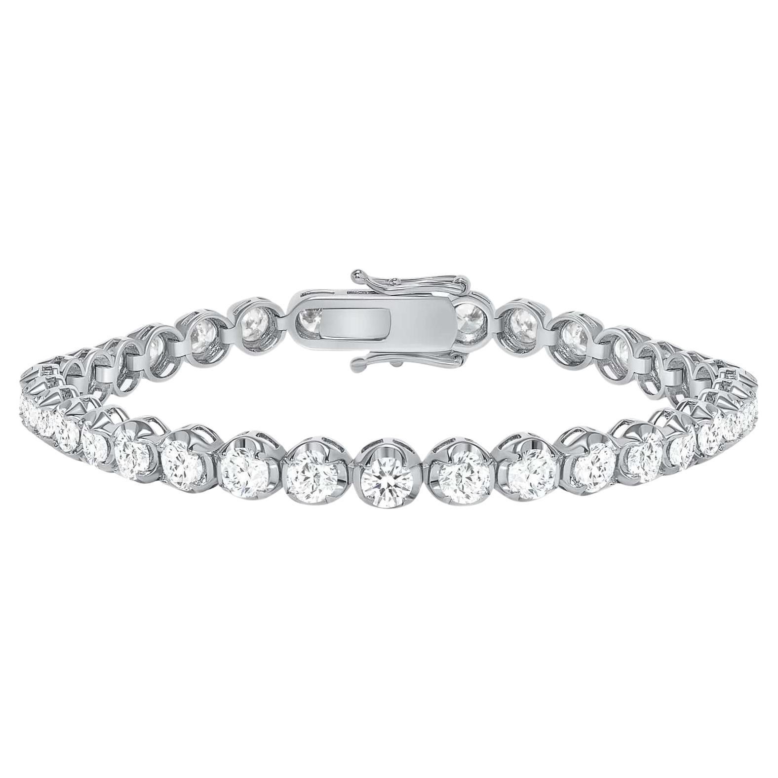 These beautiful round diamonds dance around your wrist as they absorb light and attention

Bracelet Information
Metal : 14k Gold
Diamond Cut : Round
Diamond Total Carats : 3ttcw
Diamond Clarity : VS -SI
Diamond Color : F-G
Color : White Gold, Yellow